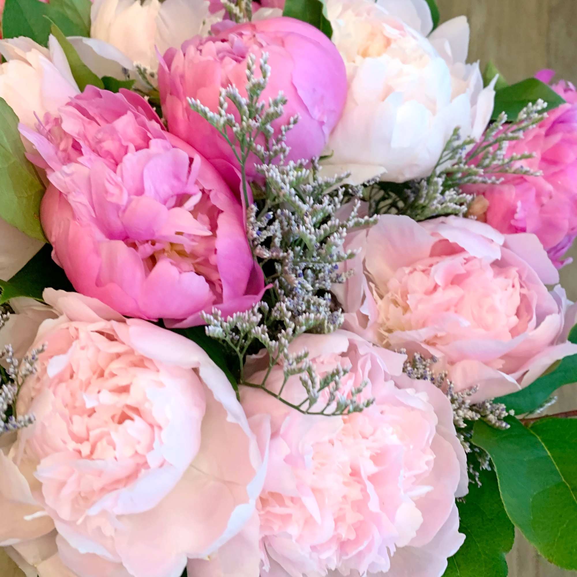 Gorgeous Dutch Peonies come together in this hand-wrapped bouquet for the peony