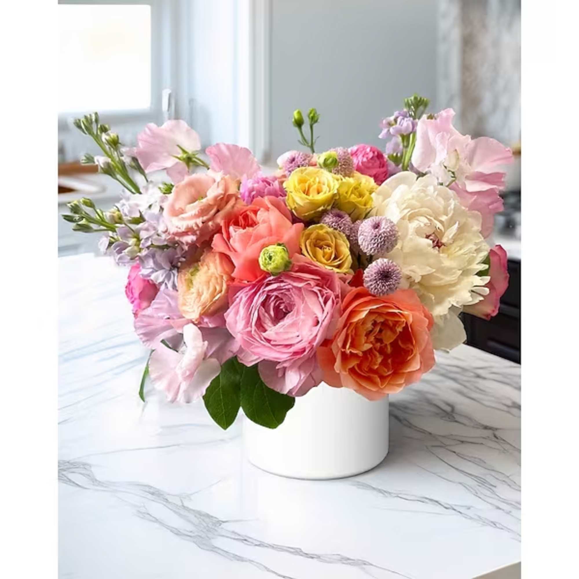 Sugar Bloom is a sweetly sophisticated arrangement that feels like a confection