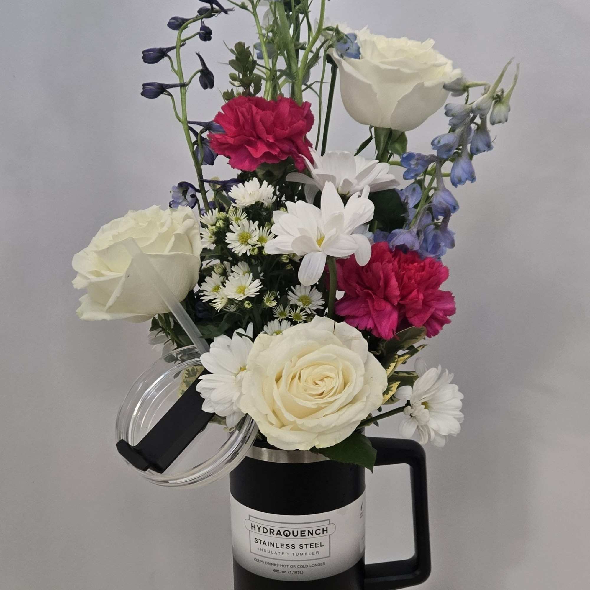 Introducing "Blossom Brew" &ndash; a unique floral arrangement presented in a 40oz