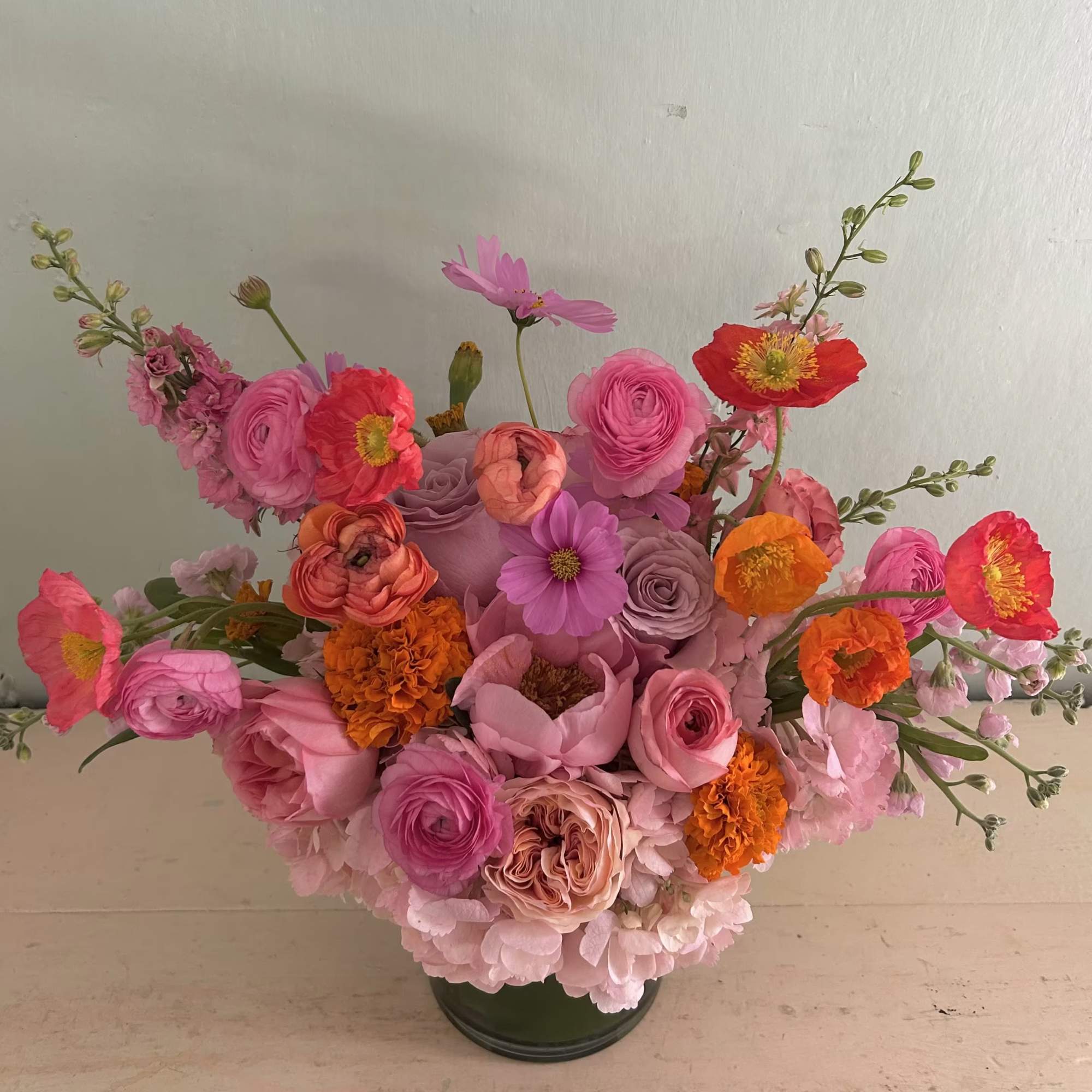 Lively and bright Holiday arrangement of gorgeous warm and vivid colors of