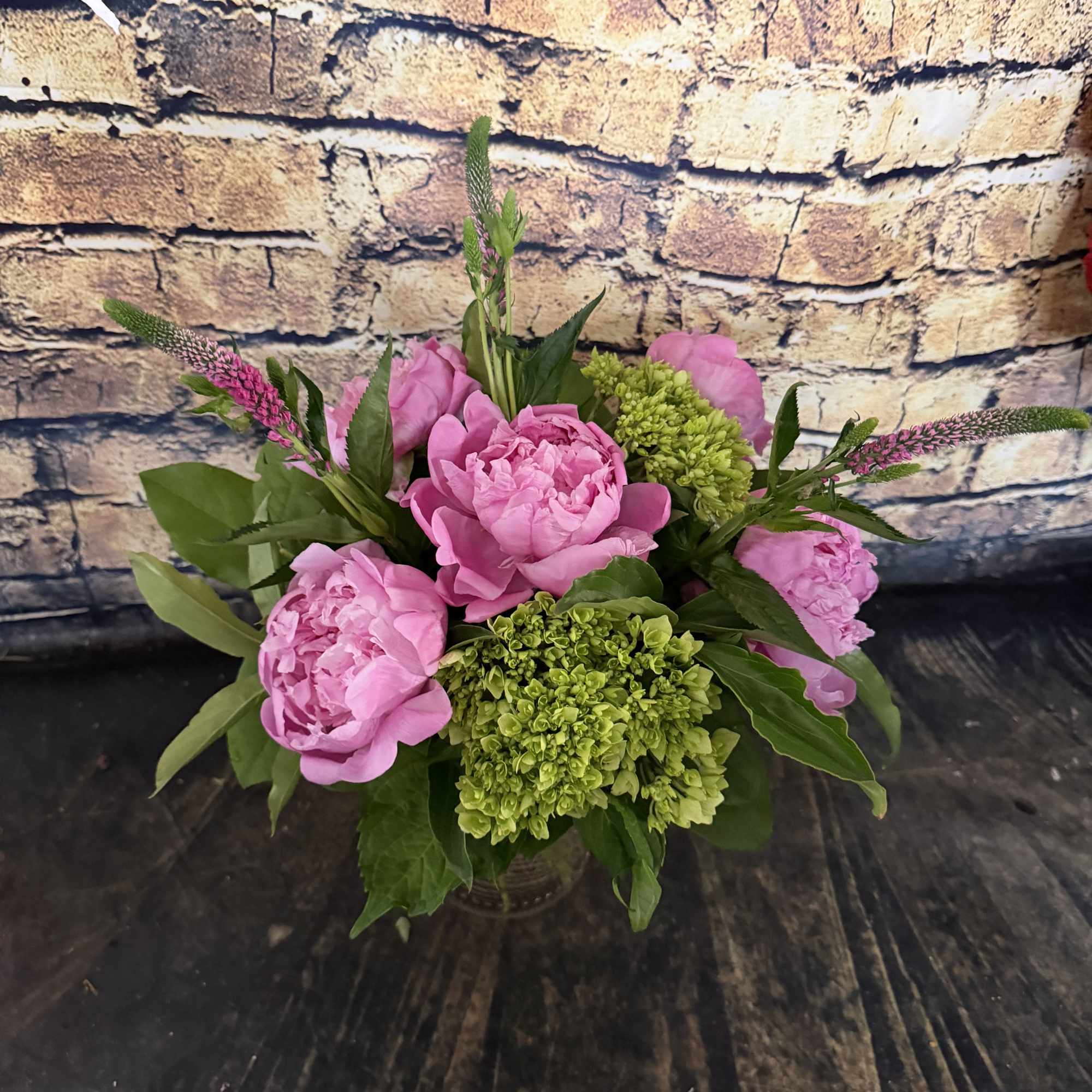 Stunning peonies mixed with mini green hydrangeas and adorned by Veronica in
