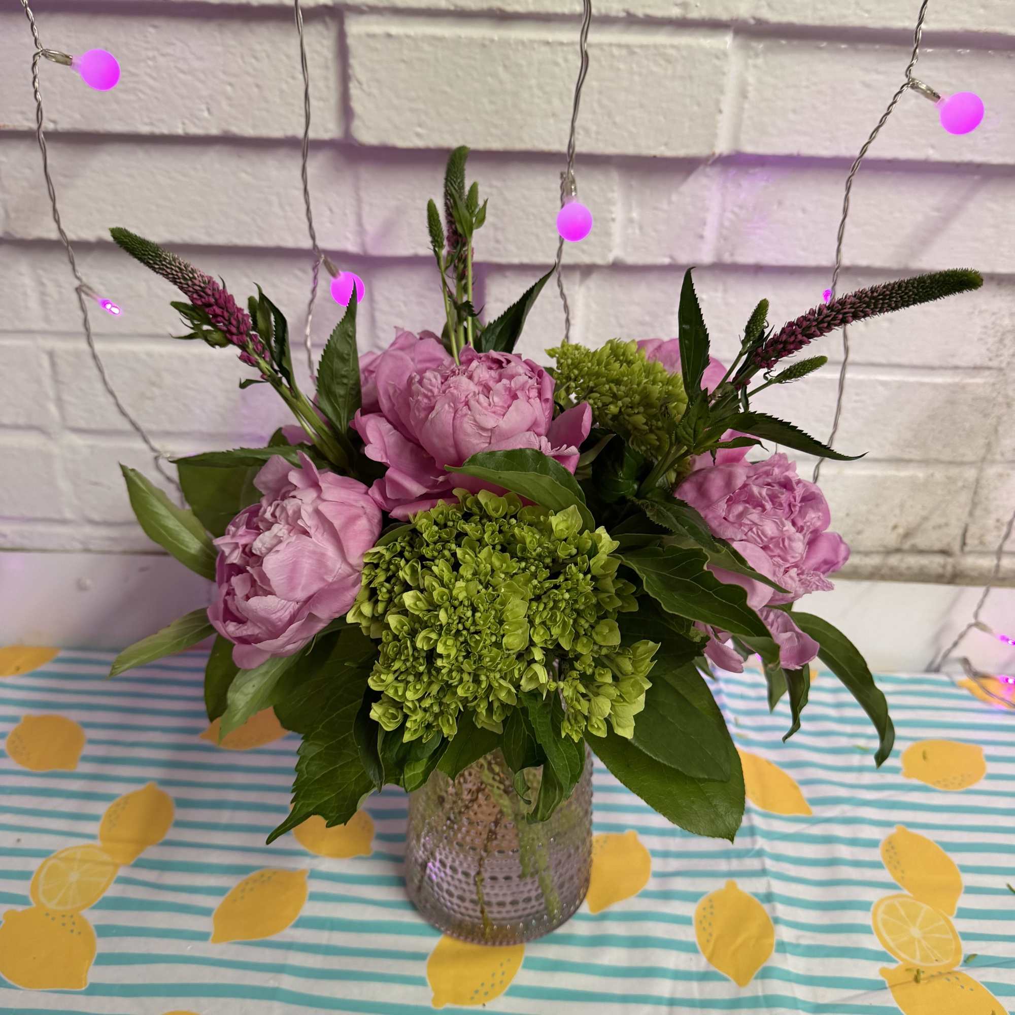 Stunning peonies mixed with mini green hydrangeas and adorned by Veronica in