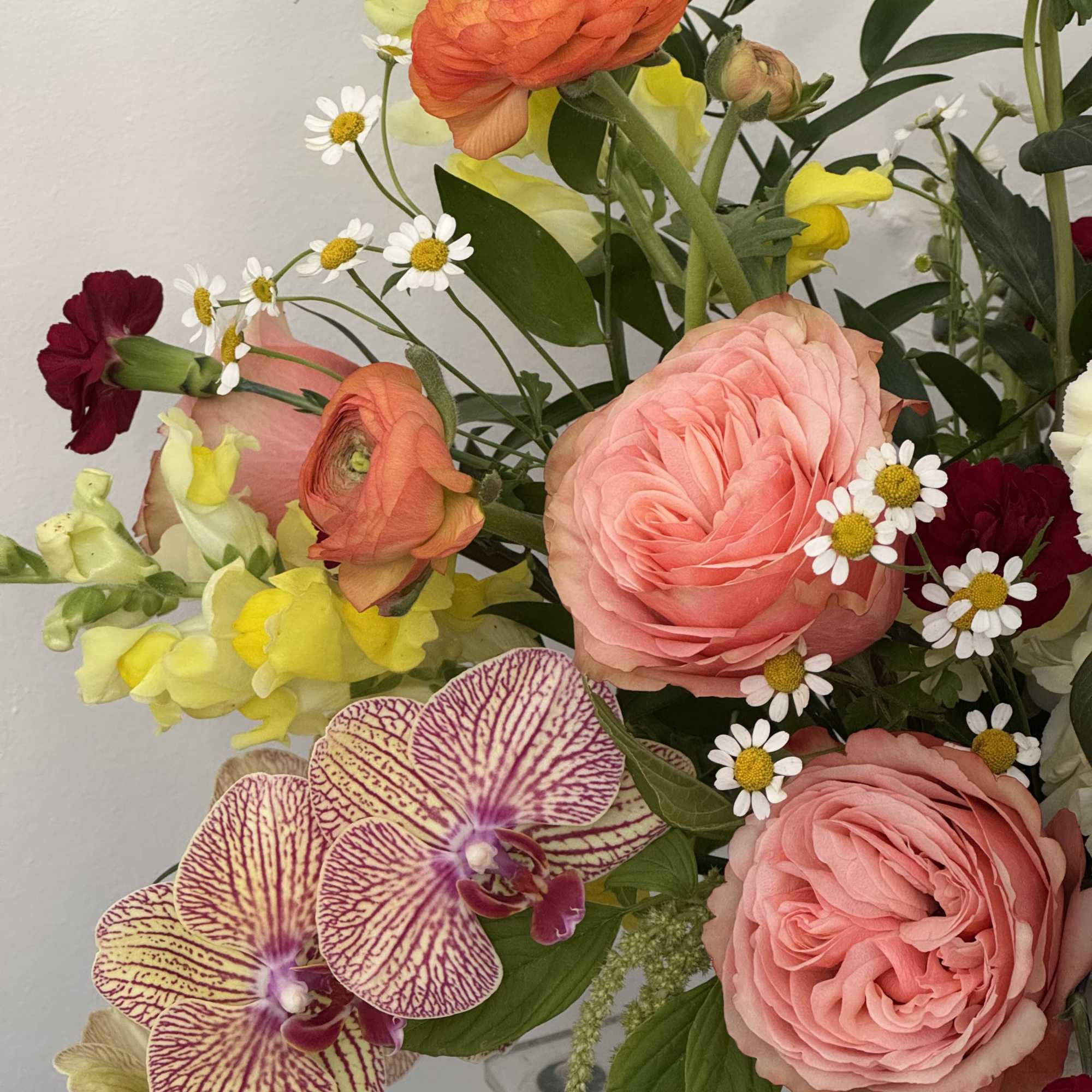 A bright, garden-fresh centerpiece that feels like a pocket of sunset-perfect as