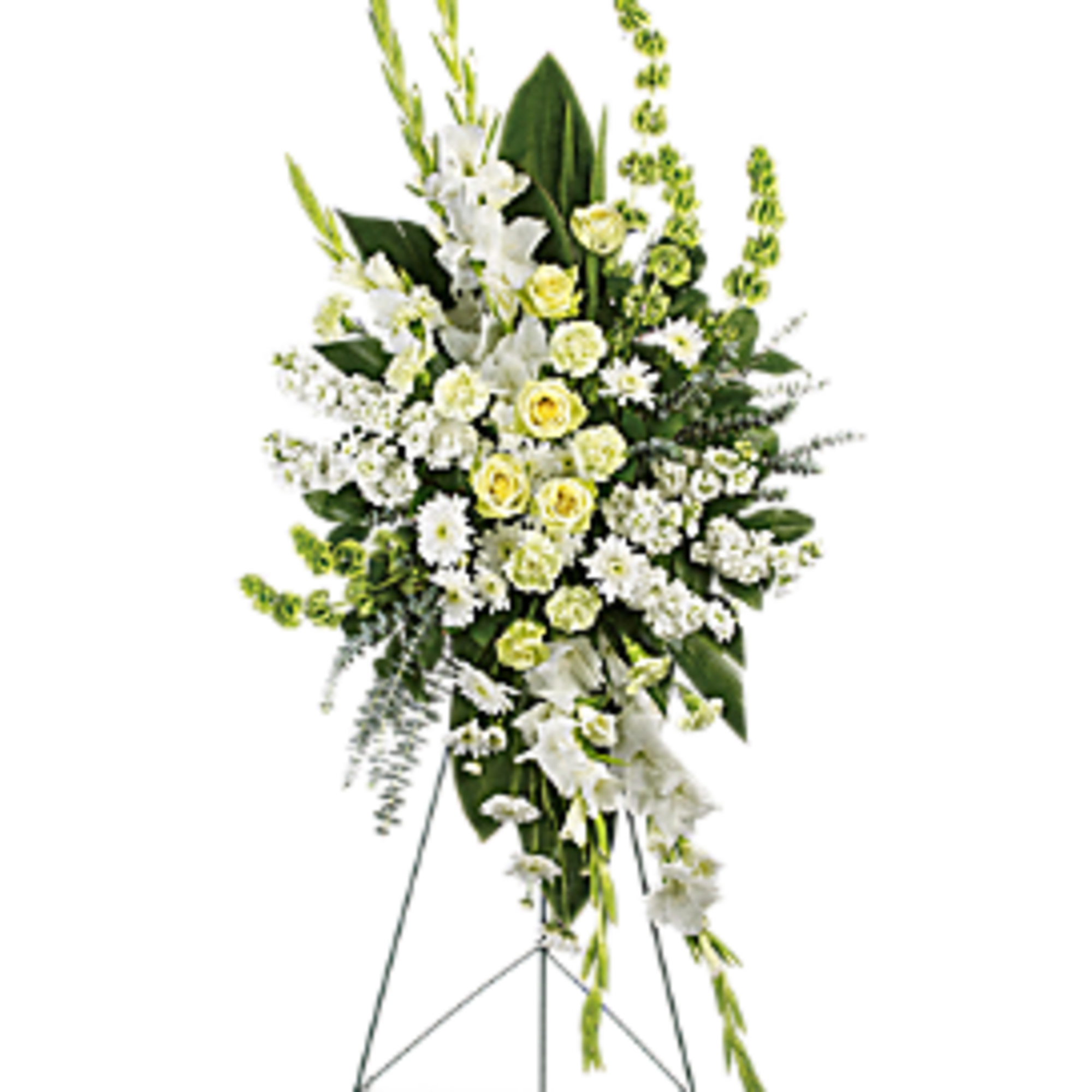 Tall white and pale yellow funeral spray on a stand