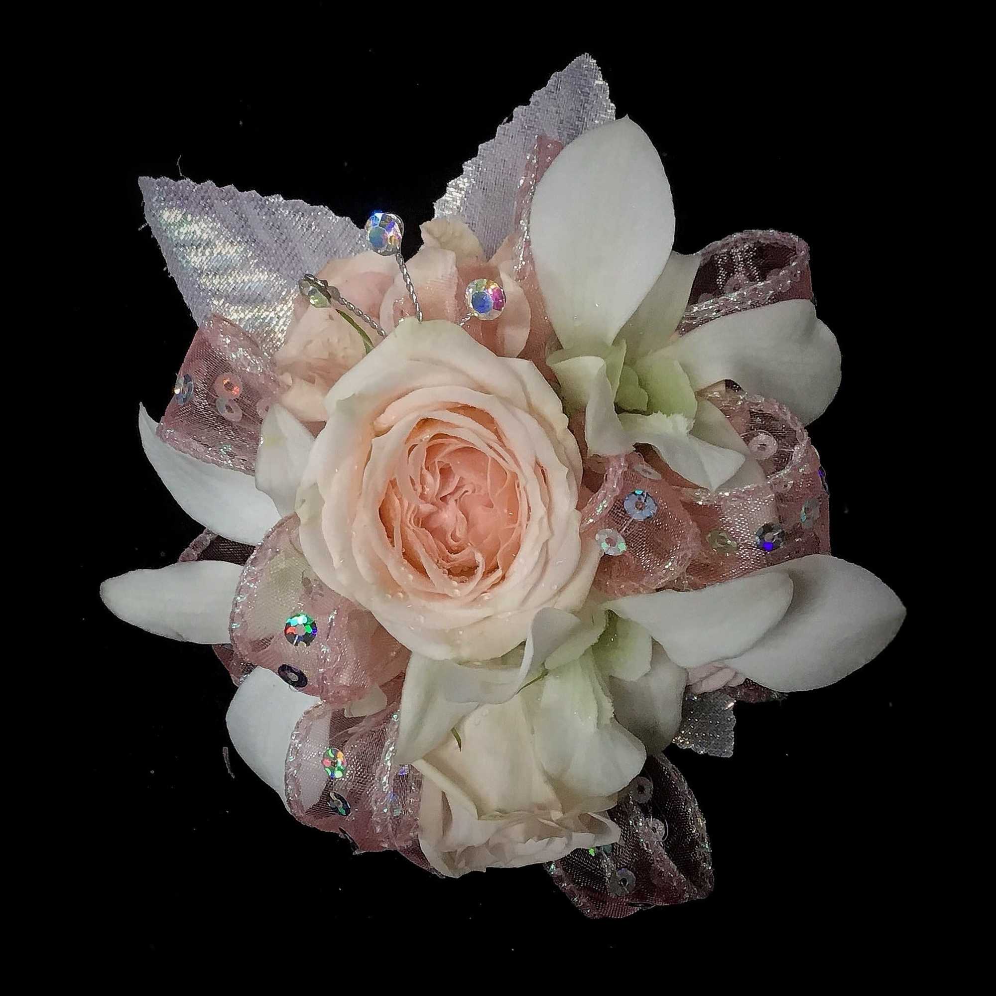 Blush rose with white petals and pink sequined ribbon accents