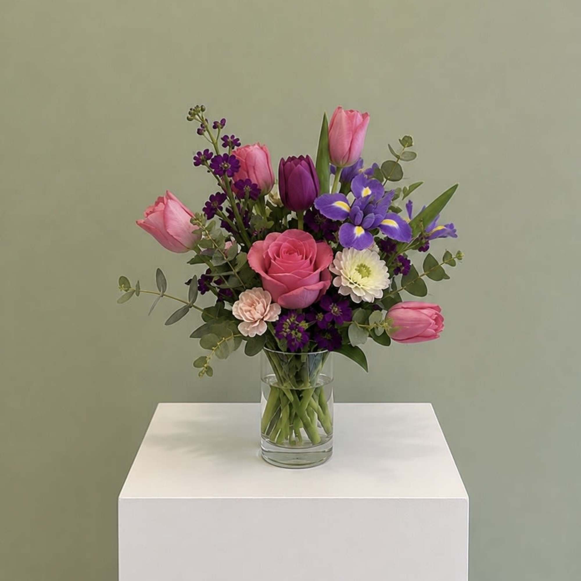 Designers choice of rich colored blooms