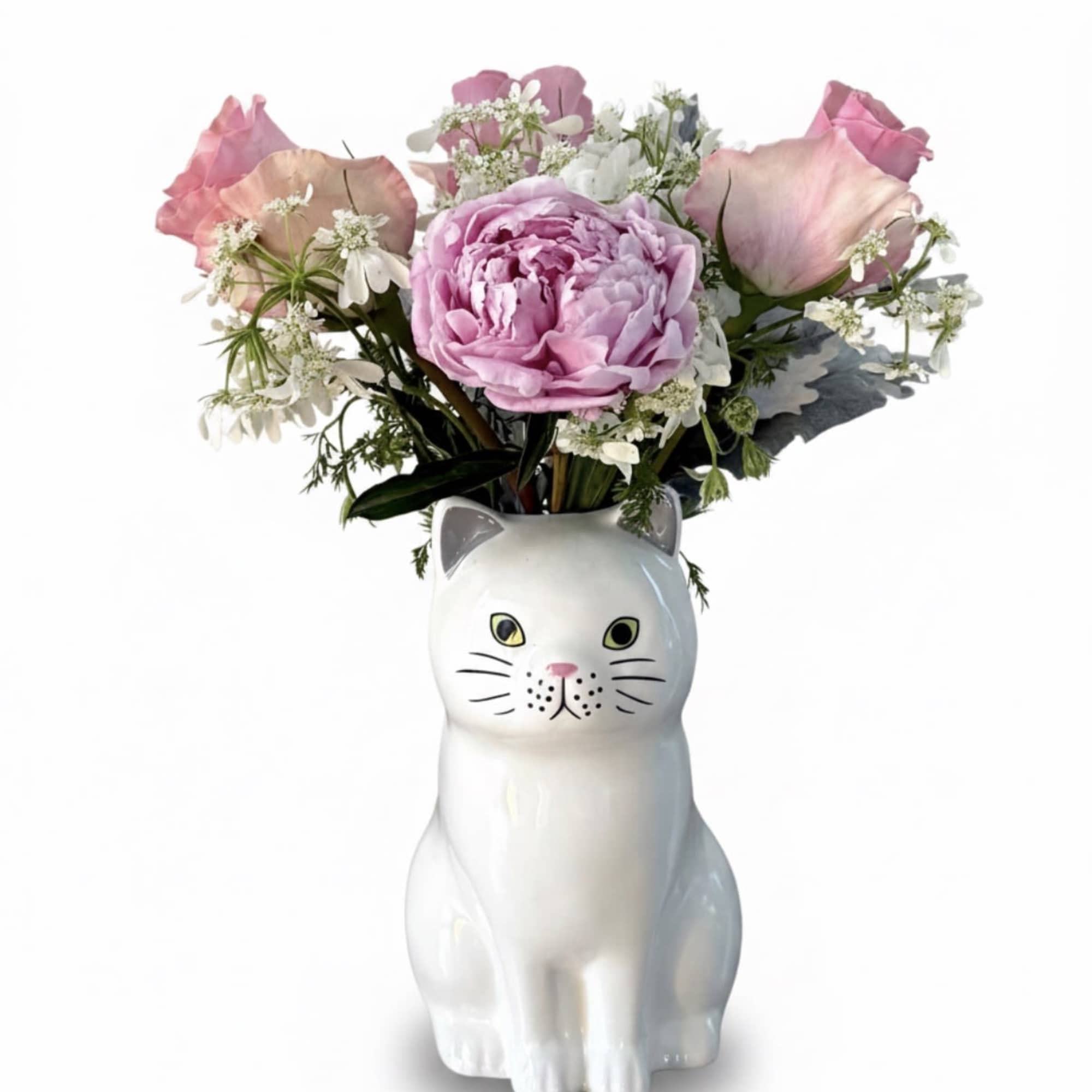 Bring a touch of "purr-fection" to your home with this delightful arrangement