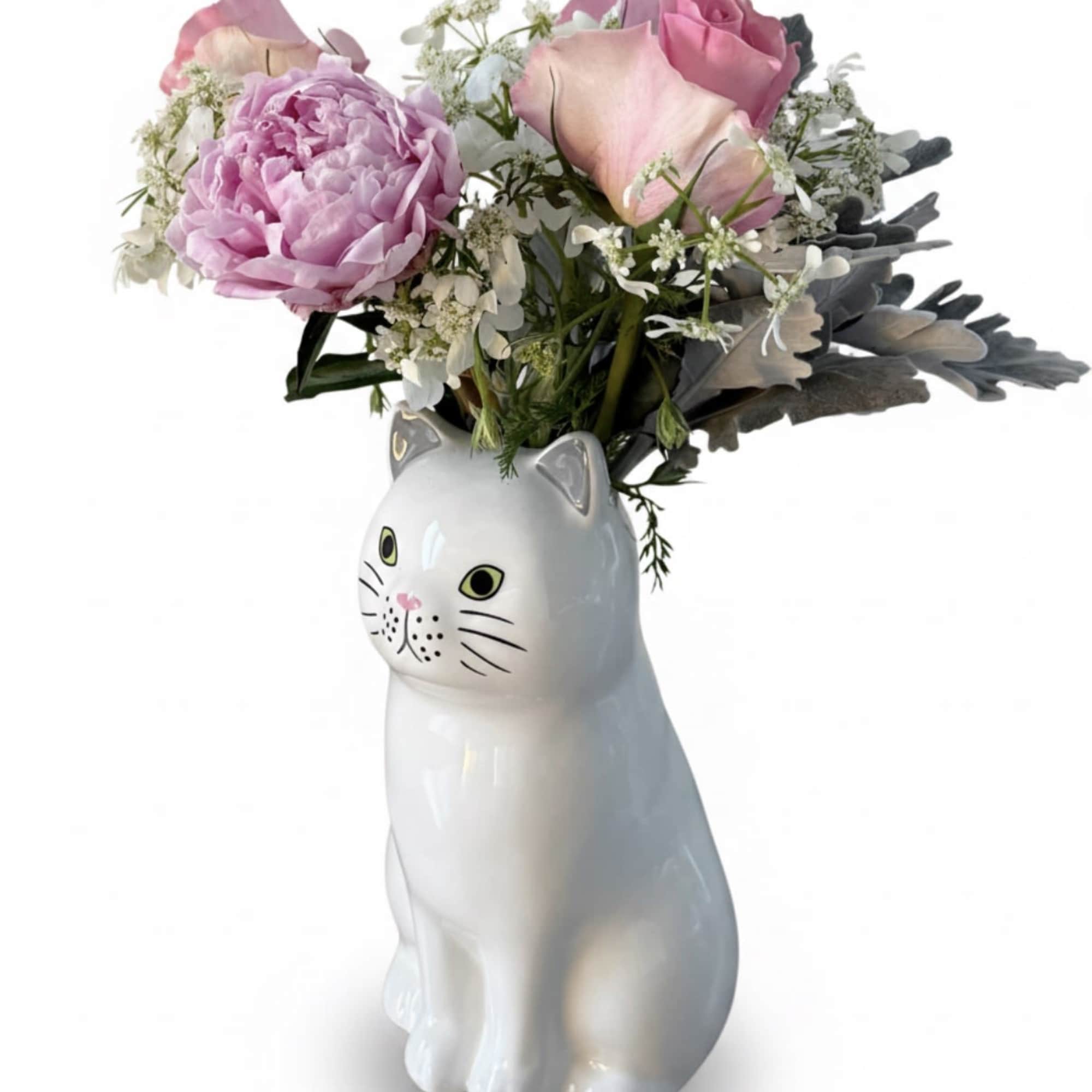 Bring a touch of "purr-fection" to your home with this delightful arrangement