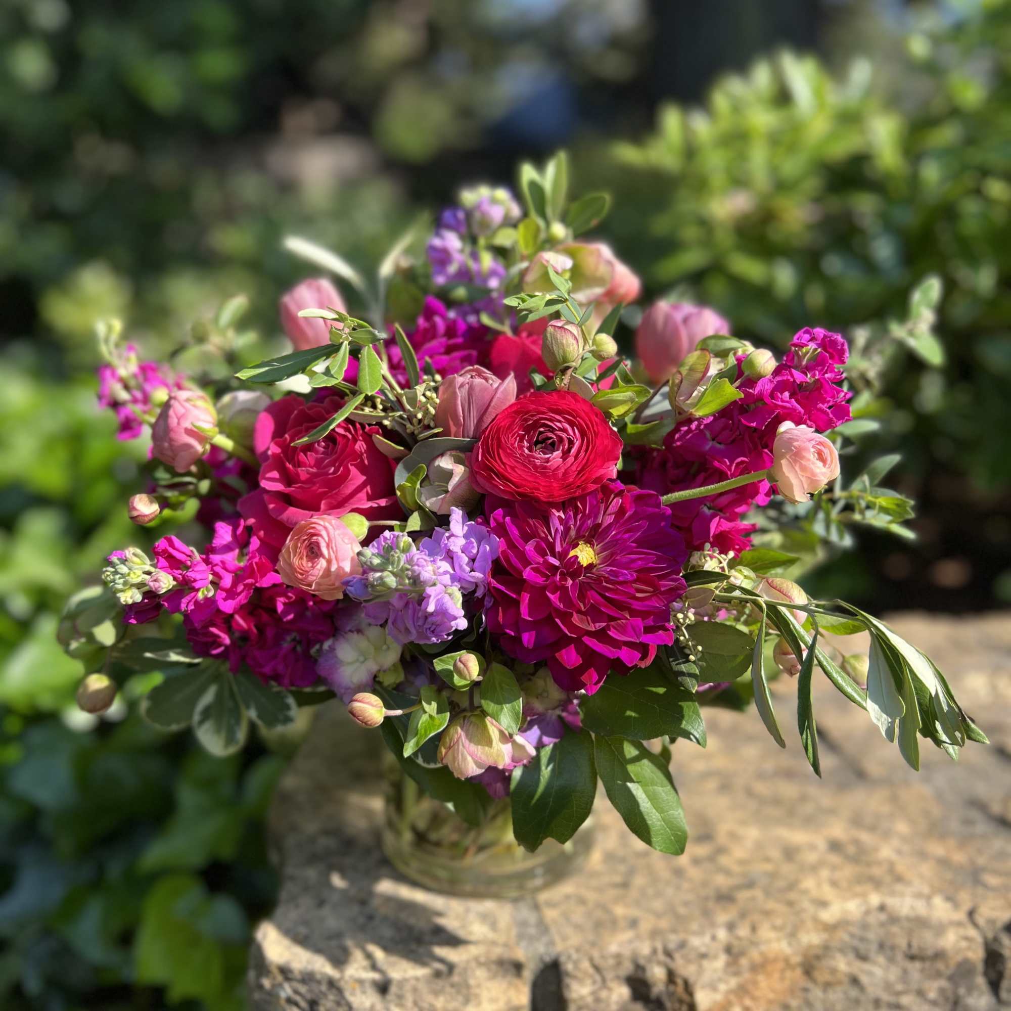 All pinks and purples for this beauty! Featuring seasonal dahlias from our
