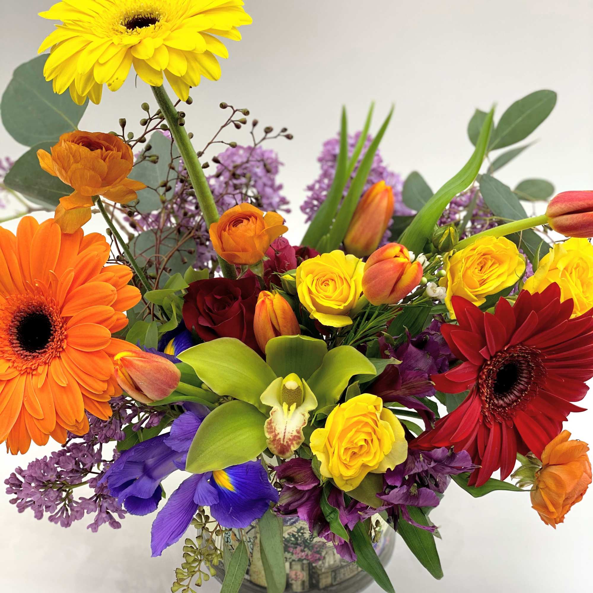 Gerbera,tulip,spray rosesalistromerialilaciris.