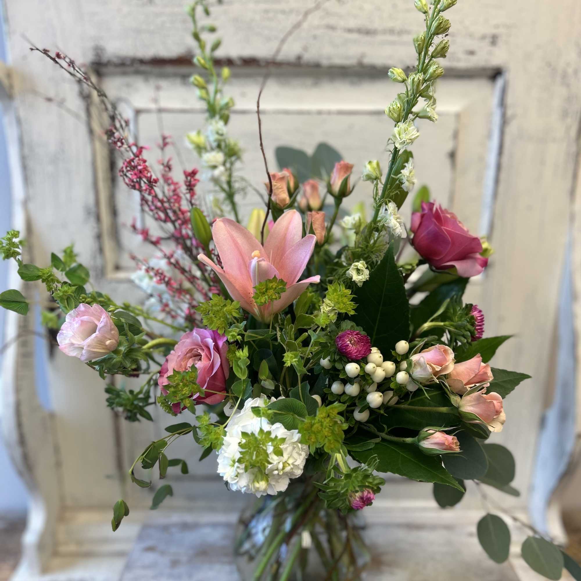 Mixed pink and white bouquet in a glass vase