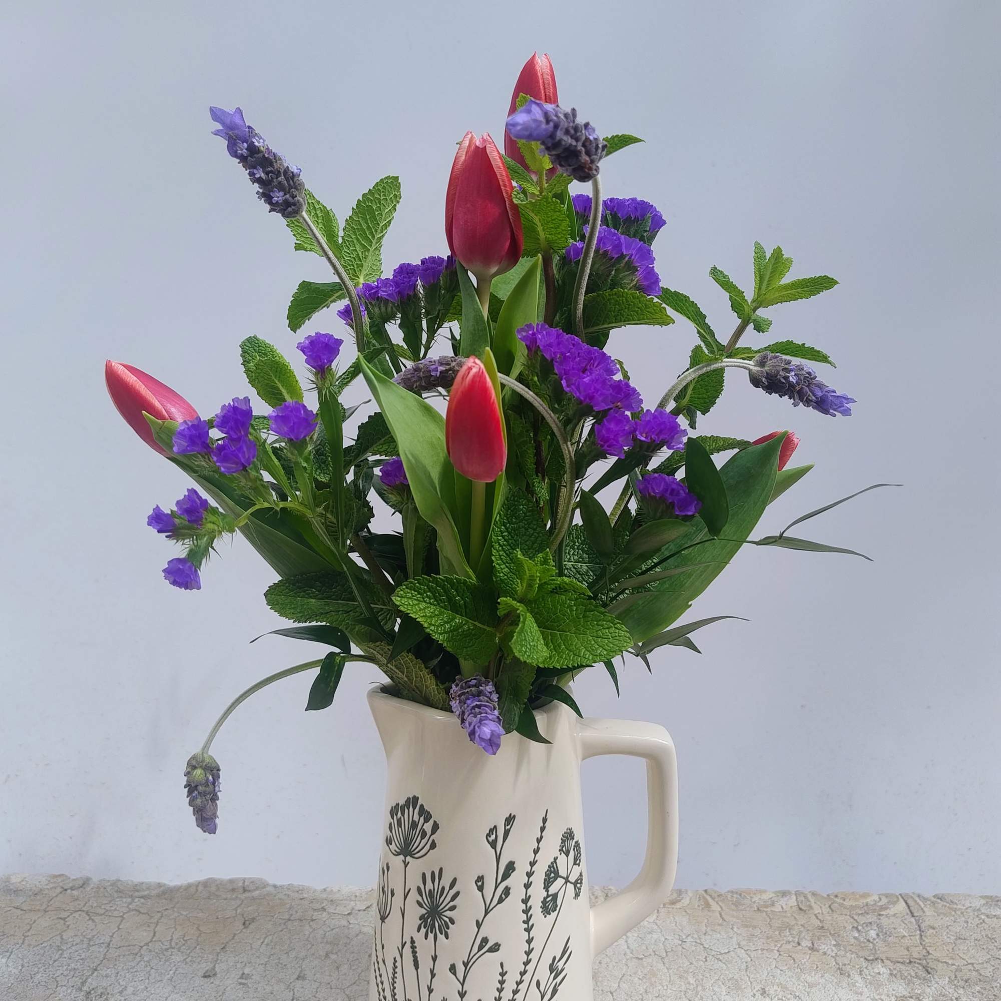 Awaken the senses with this bouquet of fresh mint, French lavender, tulips