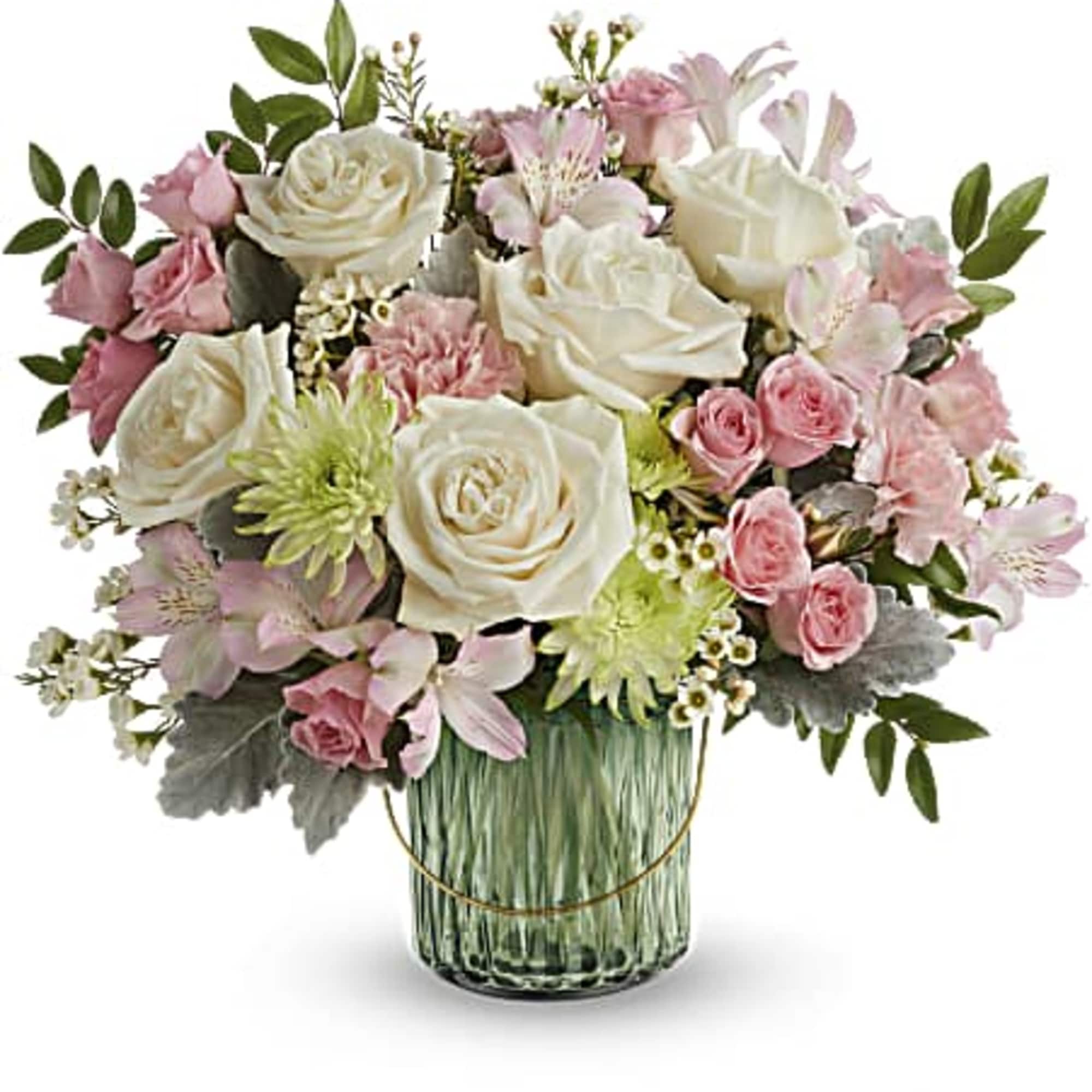 Pink and white mixed bouquet in a green glass vase