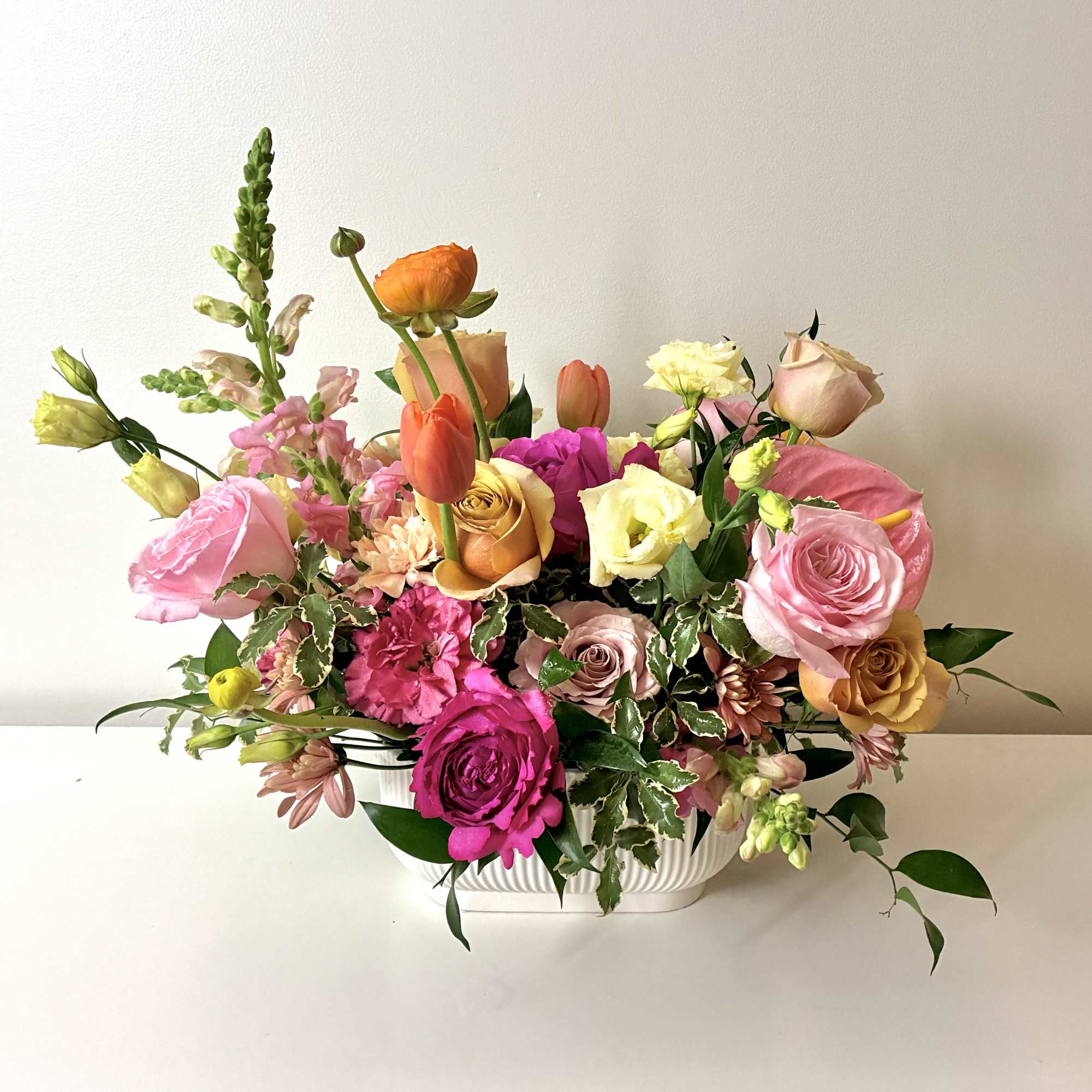 A warm, golden floral palette with yellow, honey, tangerine, and coral tones.