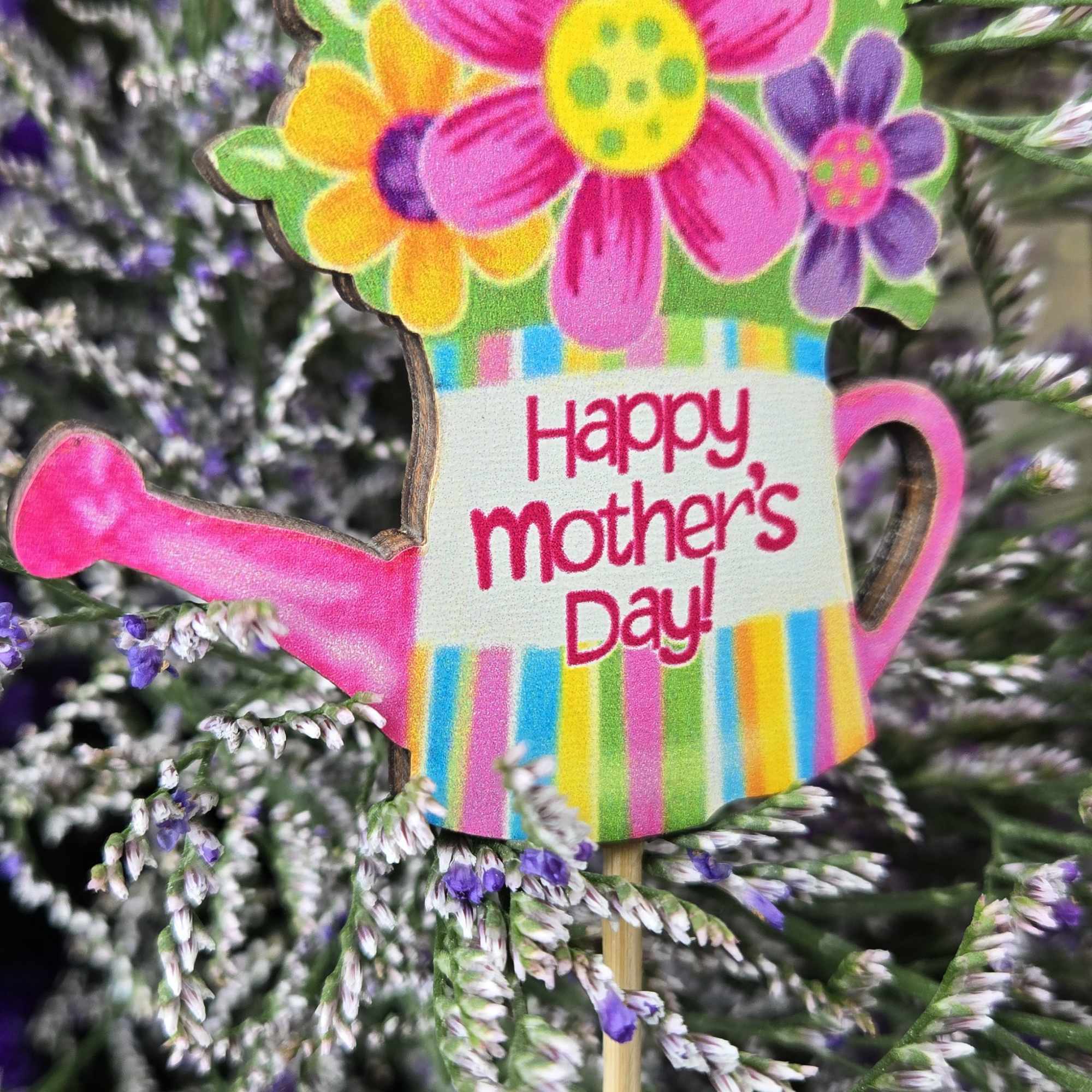 A playful watering-can pick that reads "Happy Mother's Day!" crowns a dense