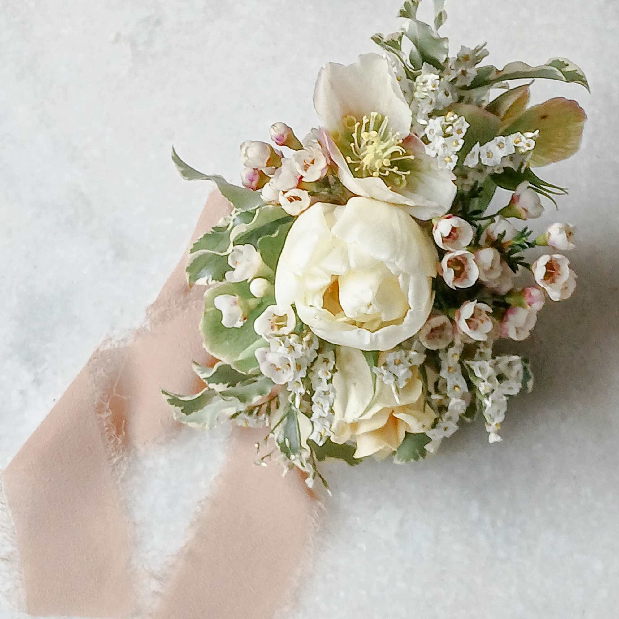 Small ivory floral bouquet with blush ribbon