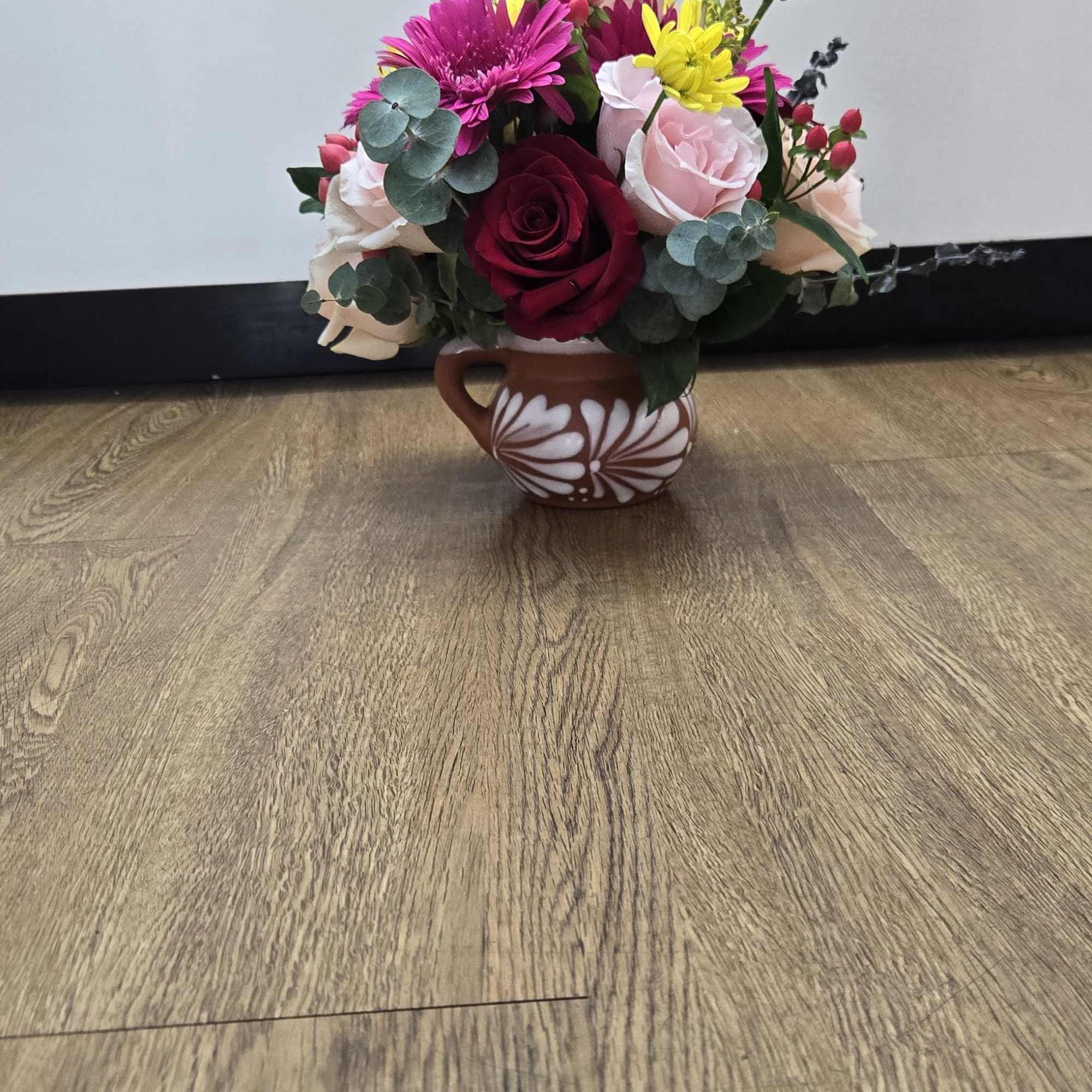 Roses carnation  and othe beautiful flowers included 