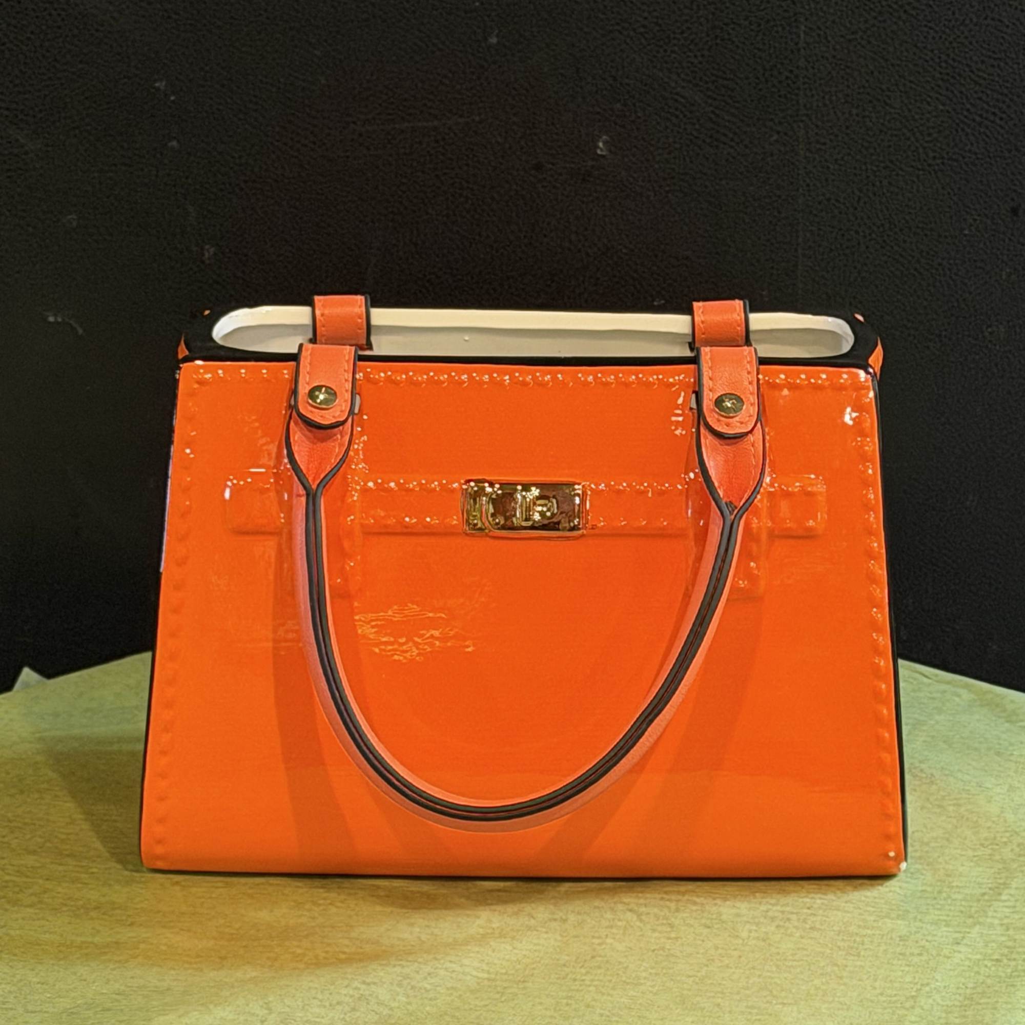 A bold, vibrant burst of color that makes a statement! Warm oranges