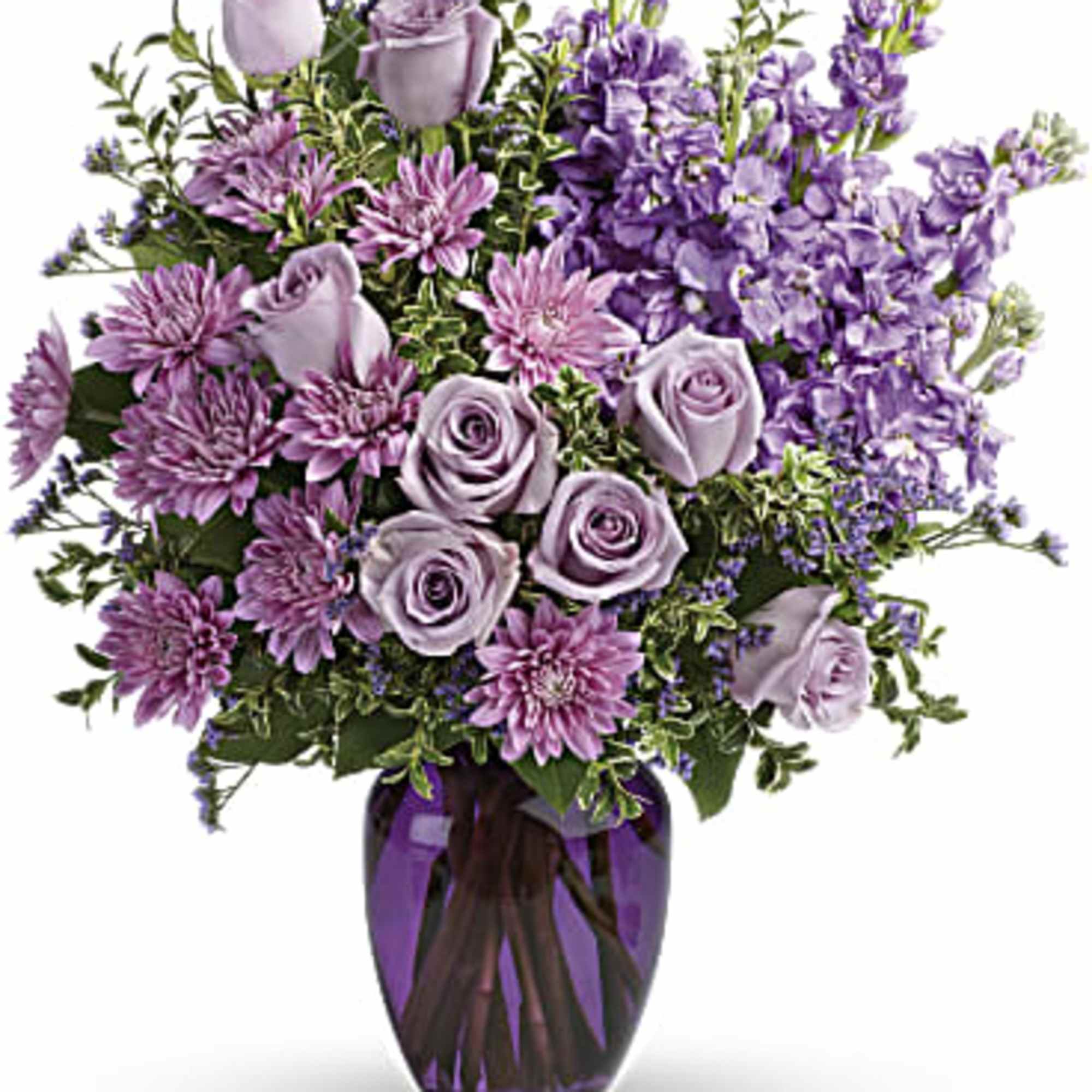 Lavender roses and purple flowers in a purple glass vase