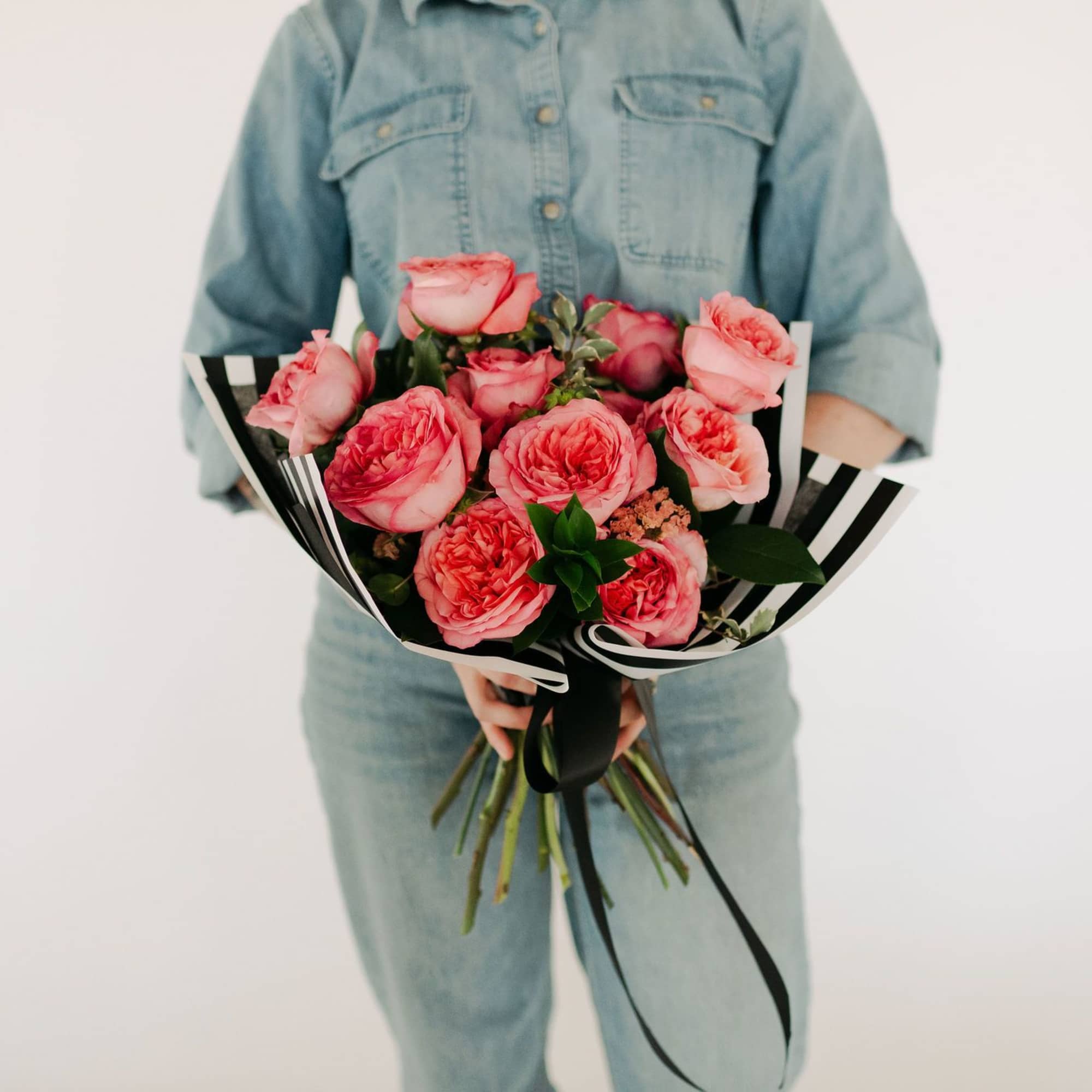 A soft, lush pink hand-tied bouquet featuring premium roses. Simple, classic, timeless!

If