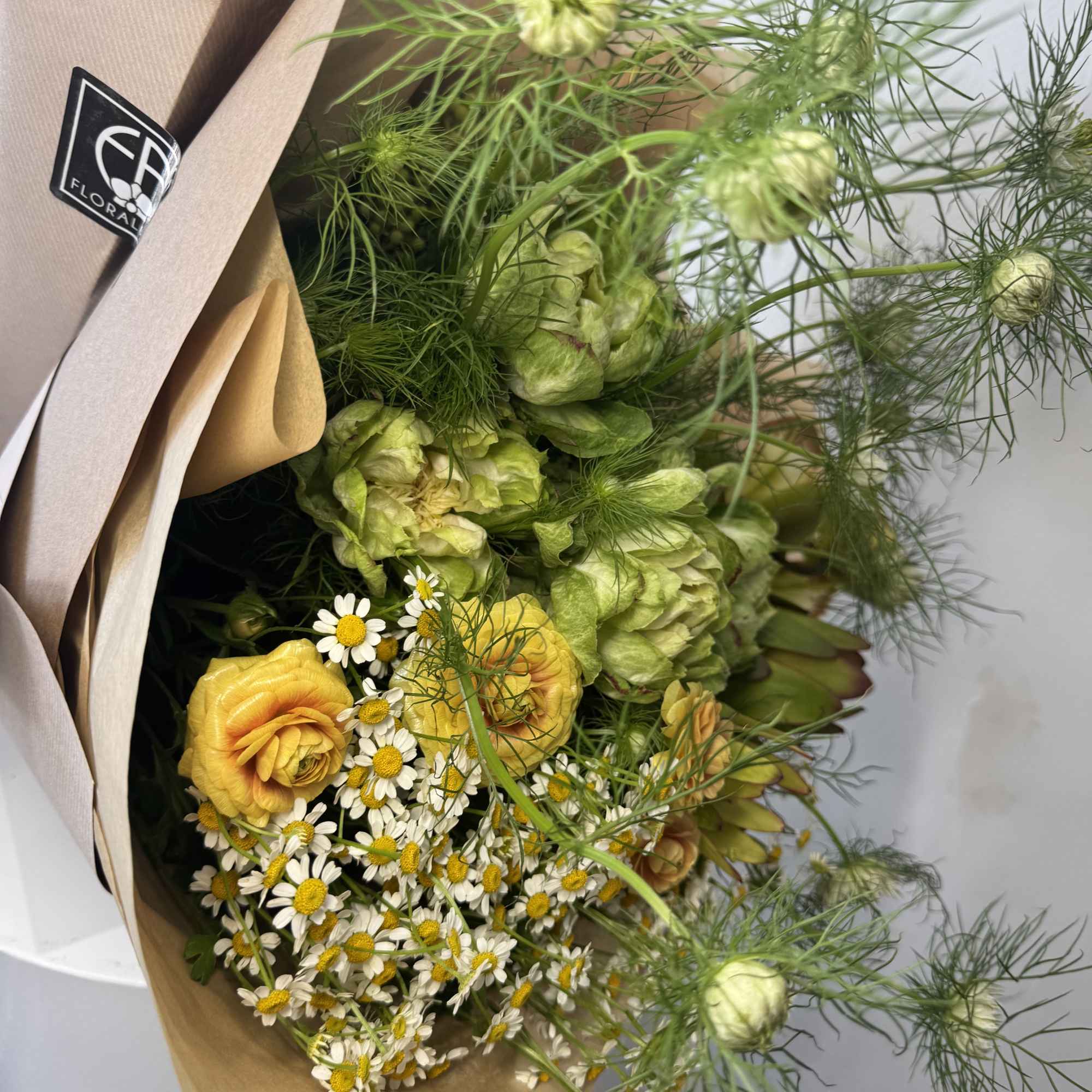 Bright, garden-fresh design: a hand-tied flower arrangement perfect as a cheerful birthday