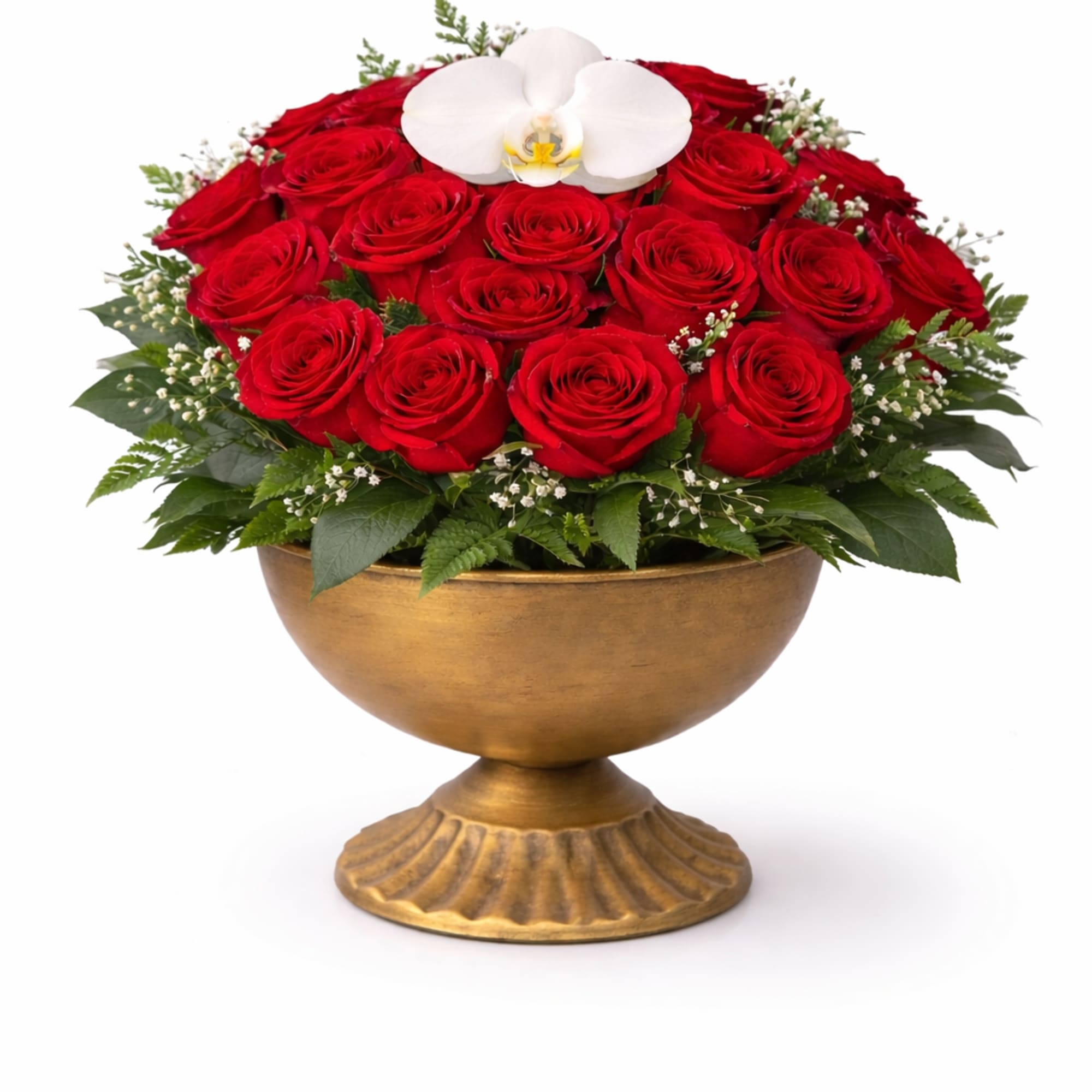 Red roses arranged in a gold pedestal bowl with a white orchid on top