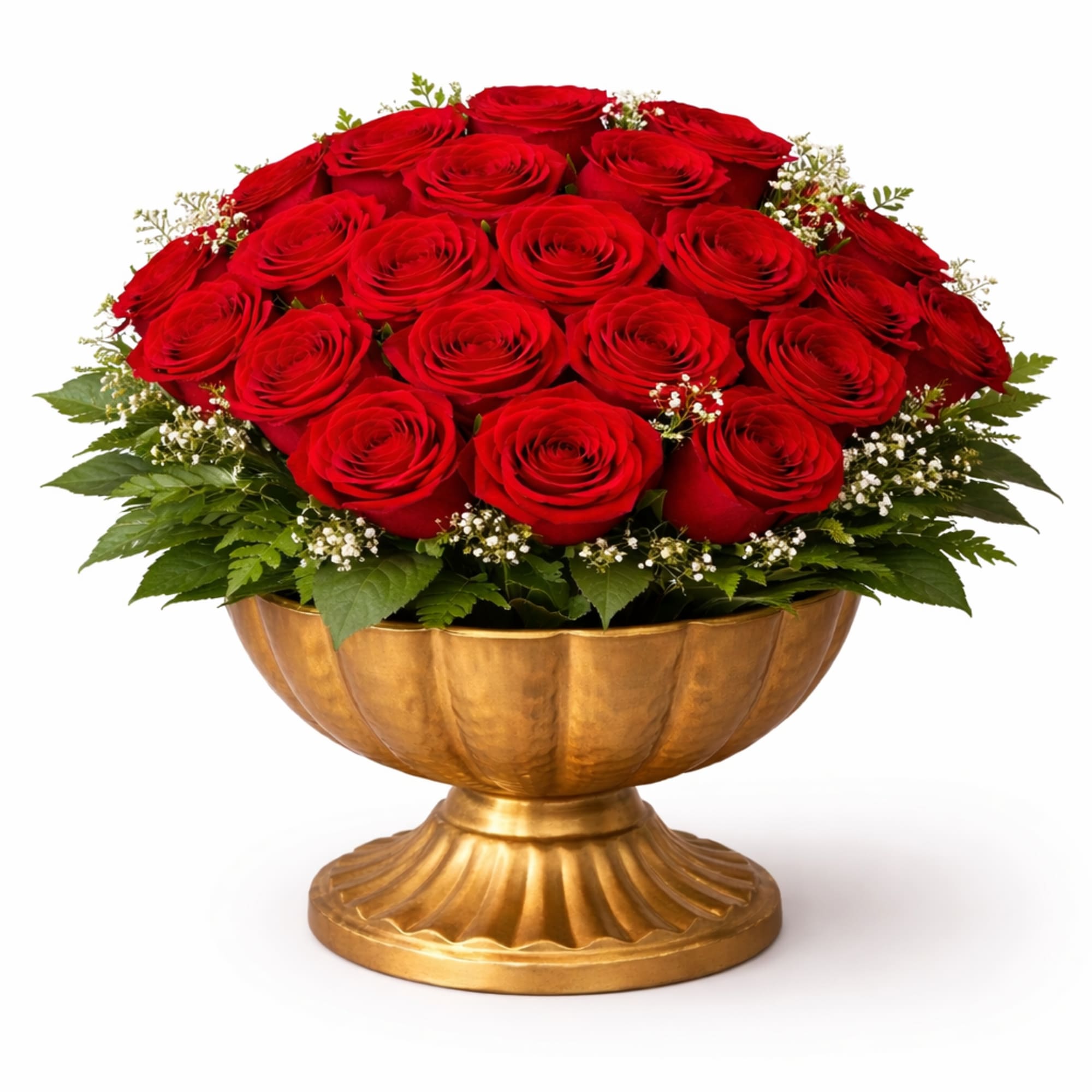 Red roses arranged in a gold pedestal bowl with white filler flowers