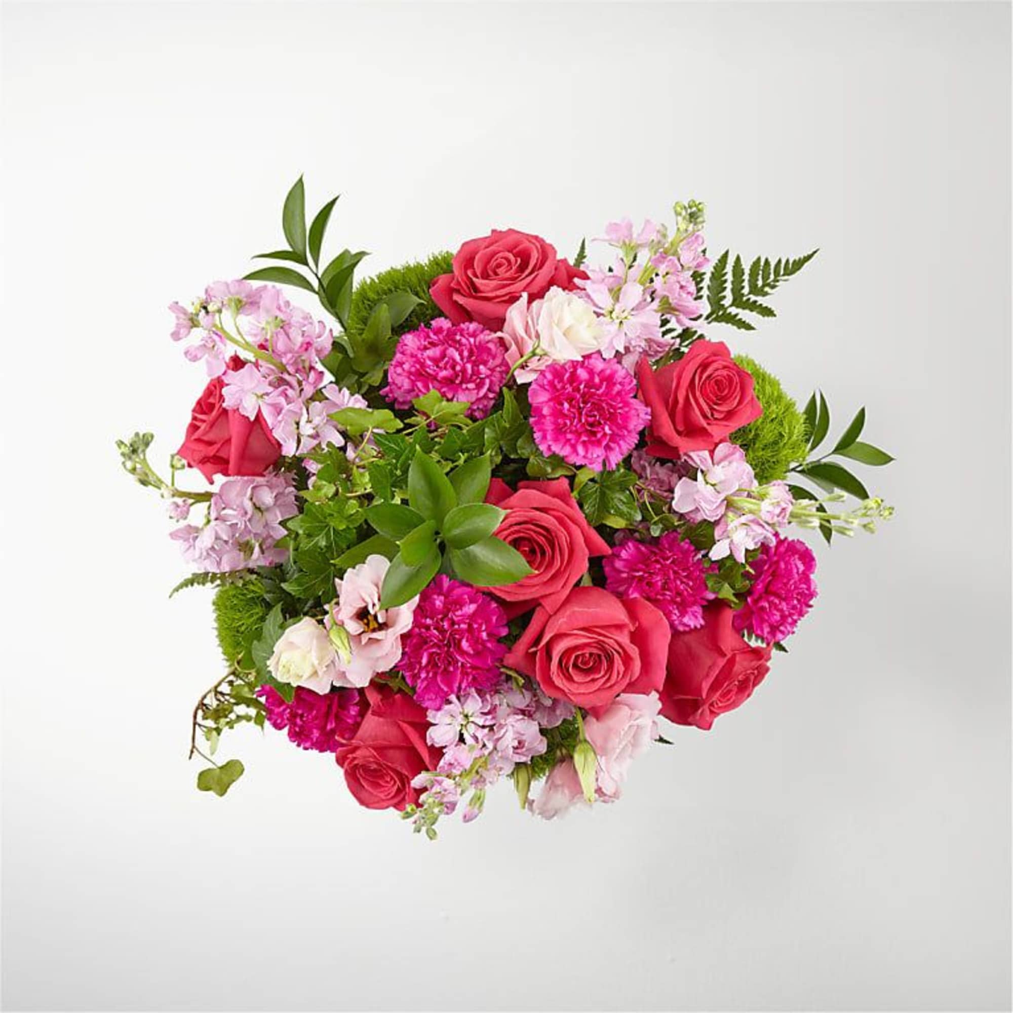 Bouquet of pink roses and carnations with light pink filler flowers