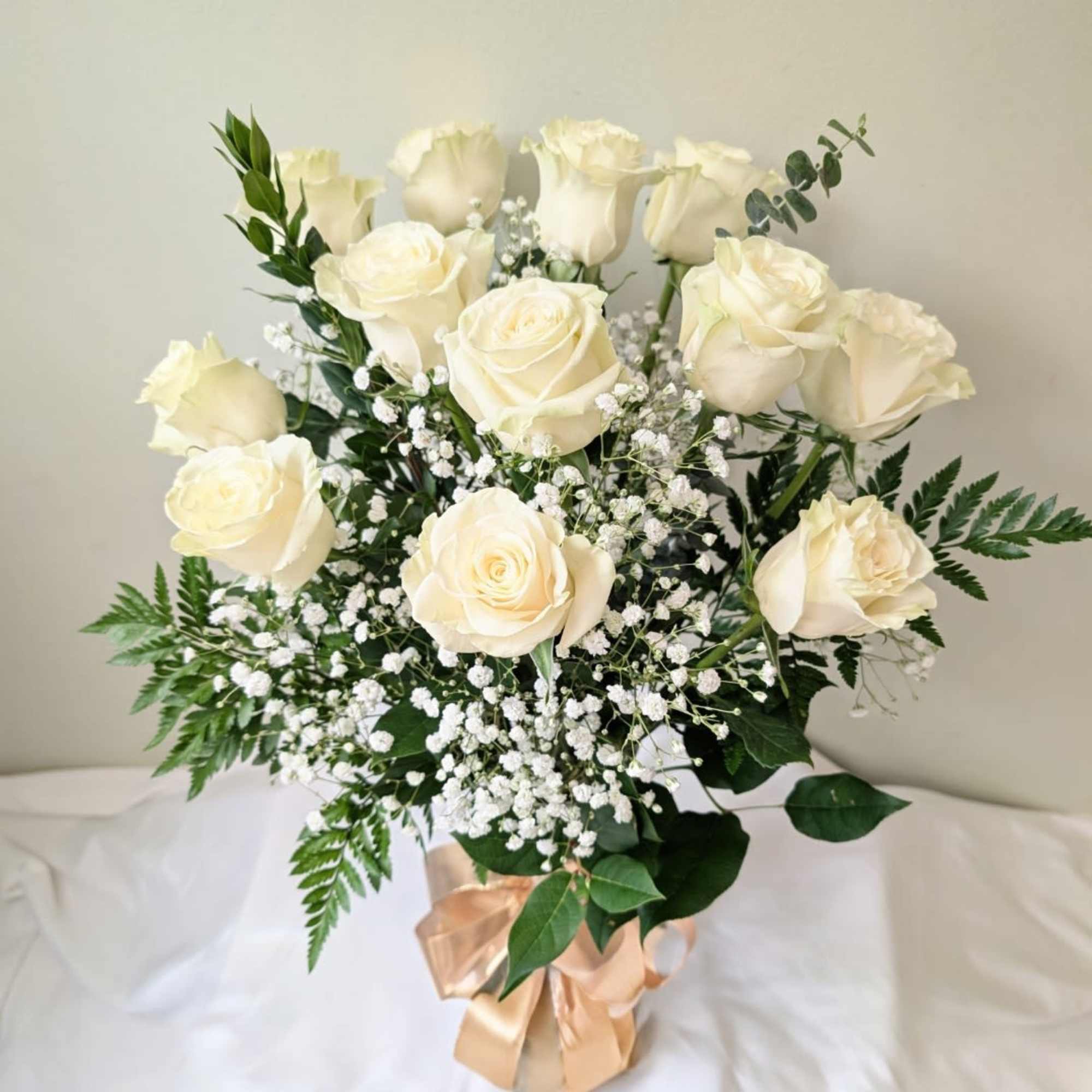 A dozen white roses are a classic gift! Perfect for Valentine's Day