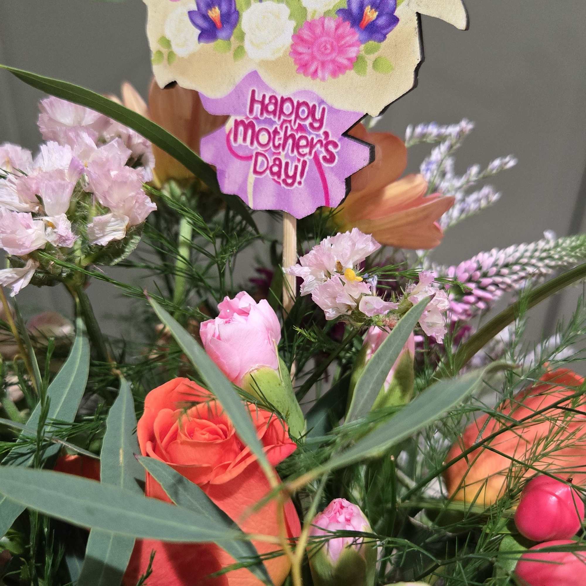 A vibrant celebration of spring, this flower arrangement is made just for