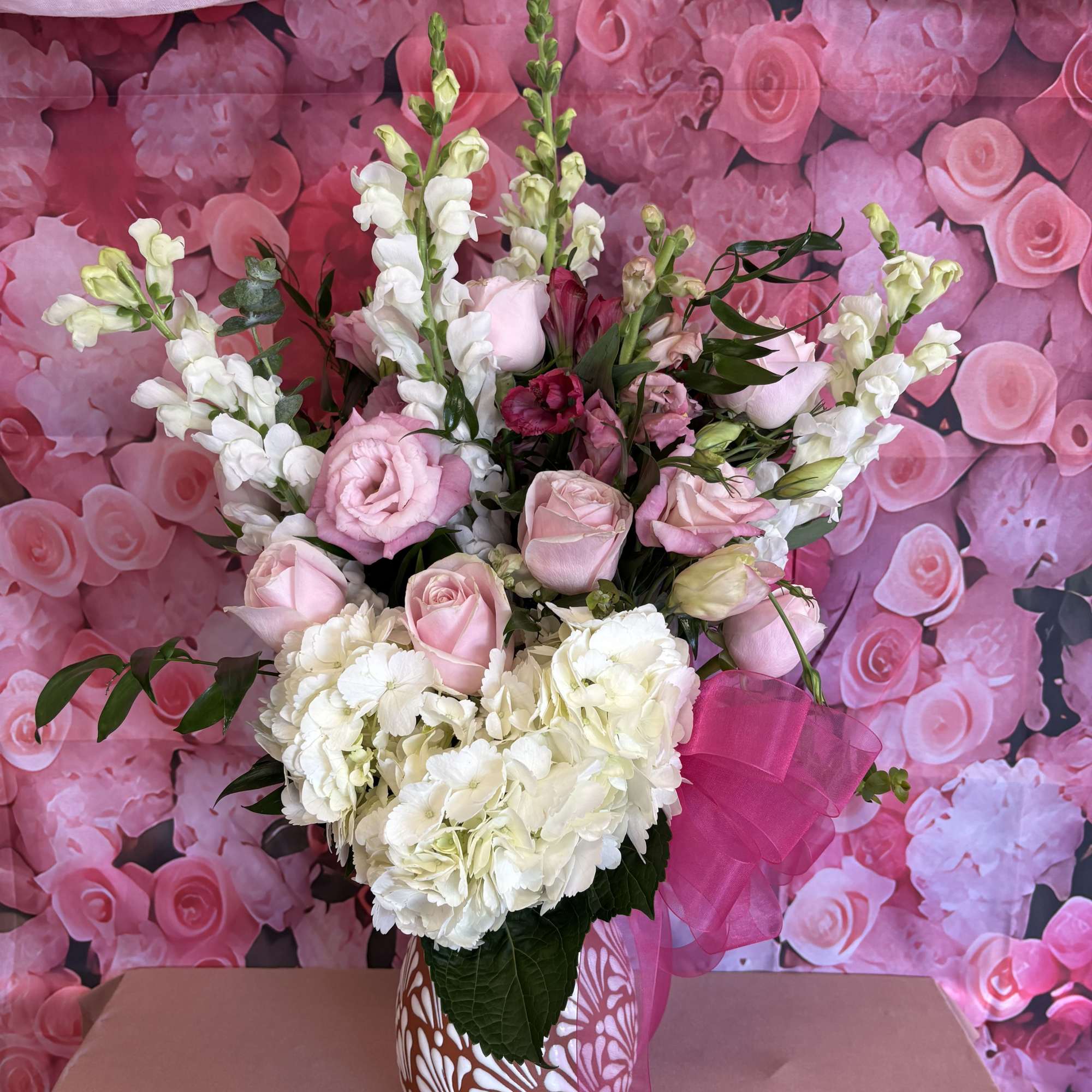 Modern vase with pink and white flowers