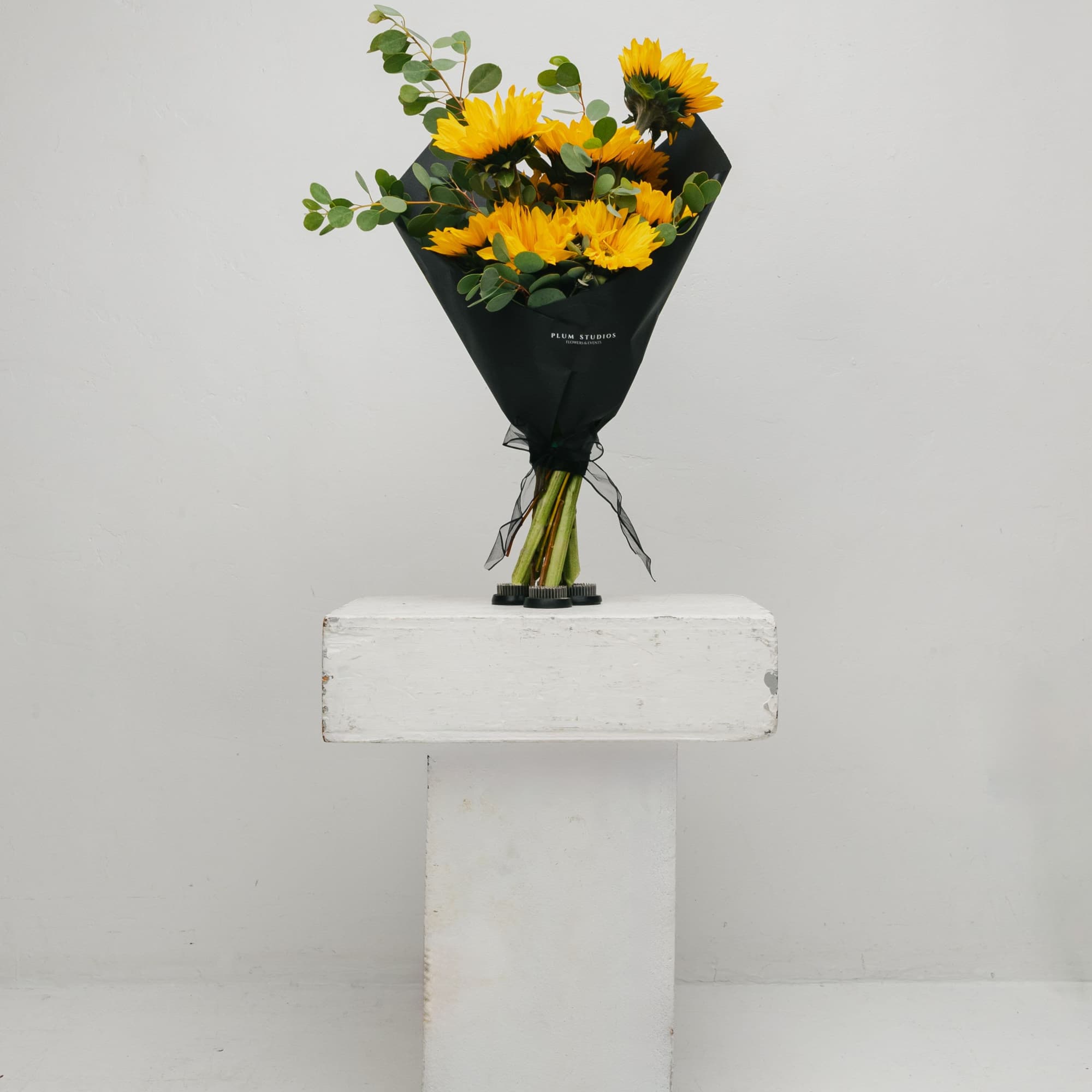 Brighten any space with our stunning Sunflower Bouquet, a cheerful arrangement that