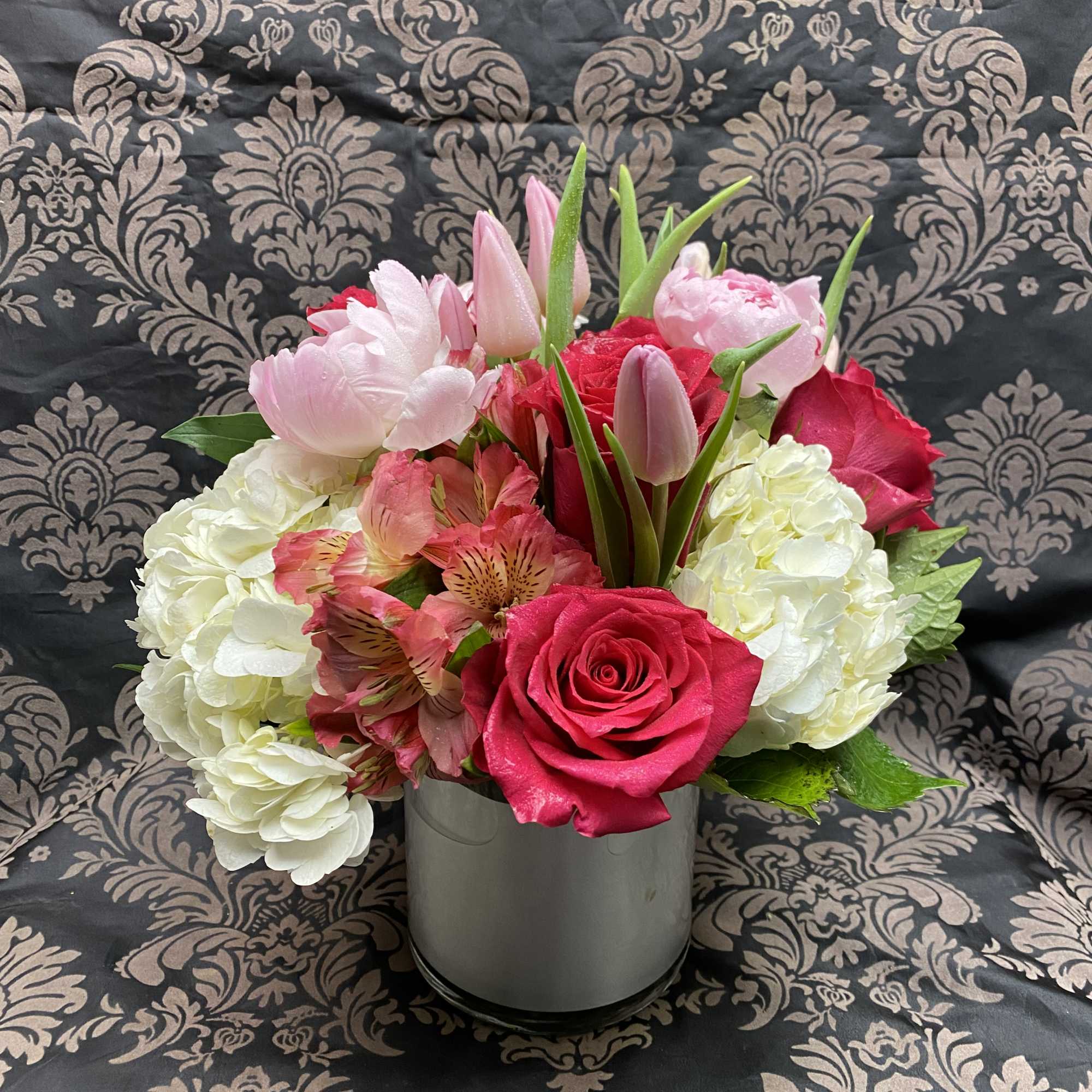 This cheerful bouquet brings lighthearted fun to any occasion. Fun &amp; Flirty