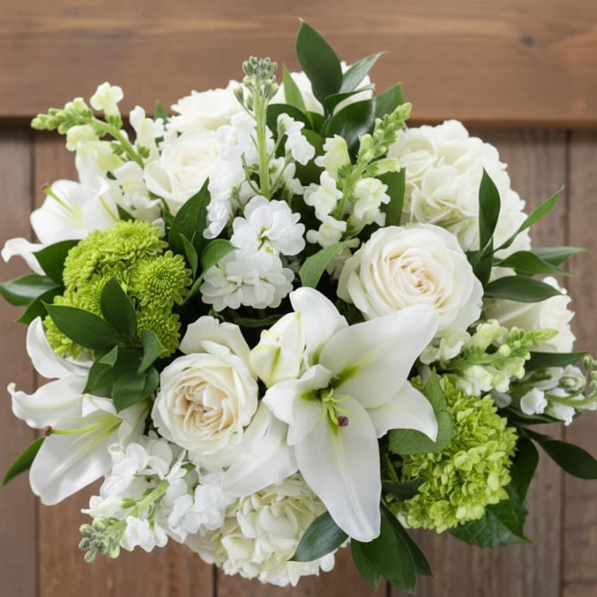  Pet Friendly?
No.  This arrangement contains lilies, which are highly toxic