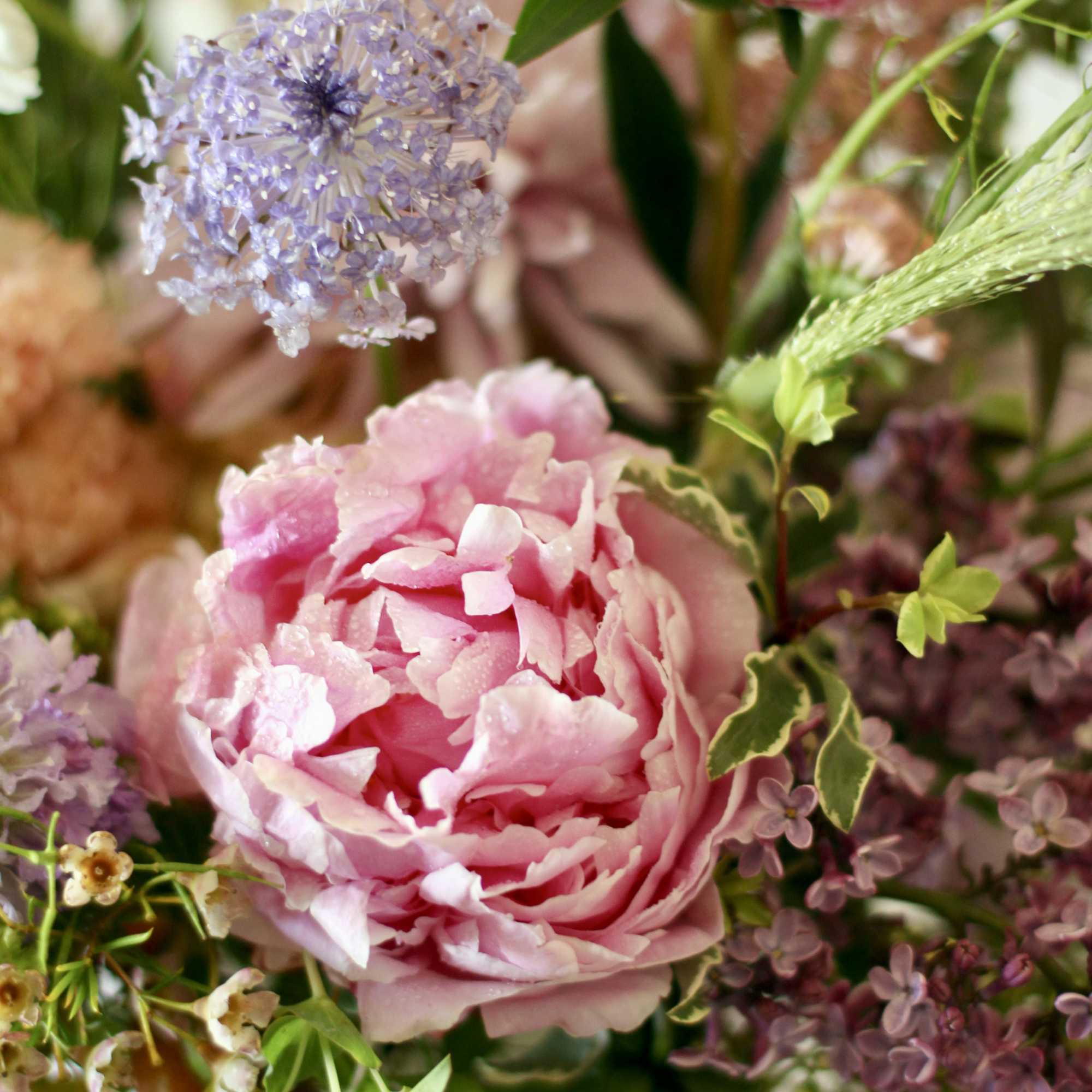 A lush and garden-style arrangement designed exclusively for Mother&rsquo;s Day, featuring premium