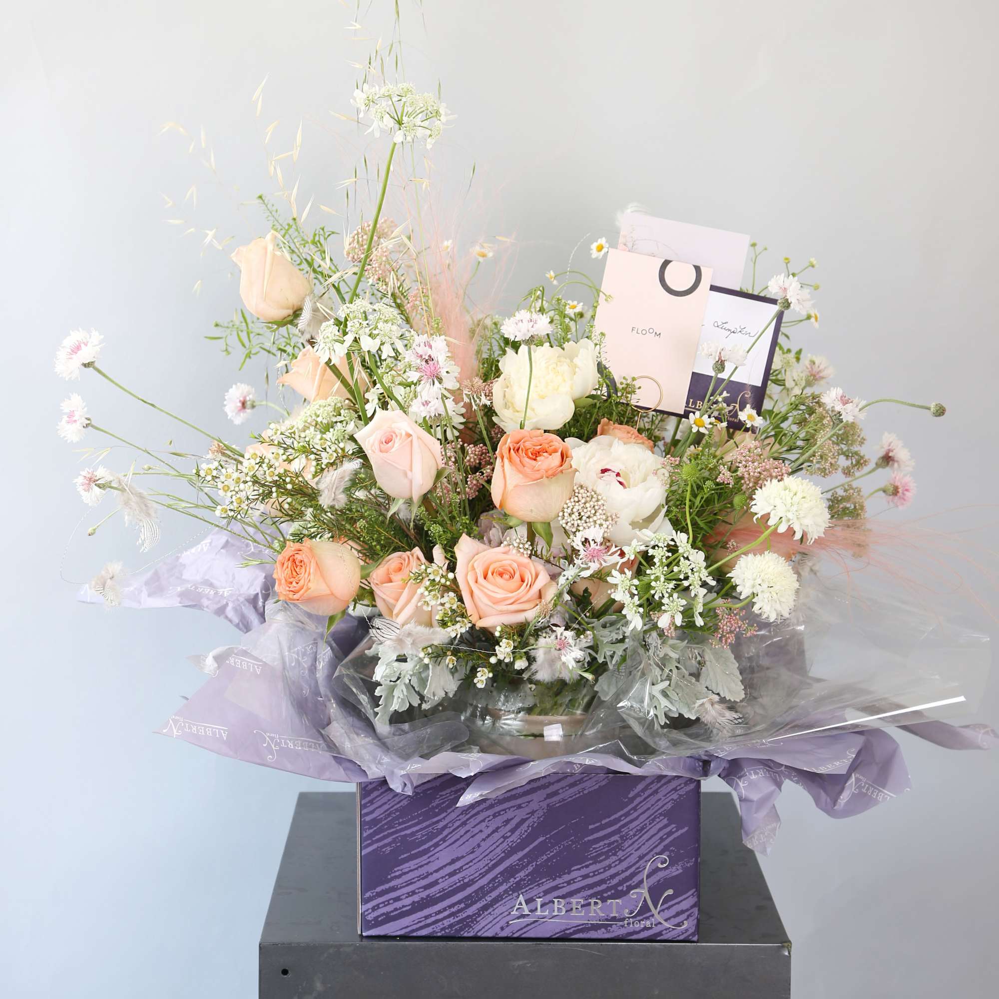 A peach Blush Ivory color palette create by Garden rose, peonies, seasonal