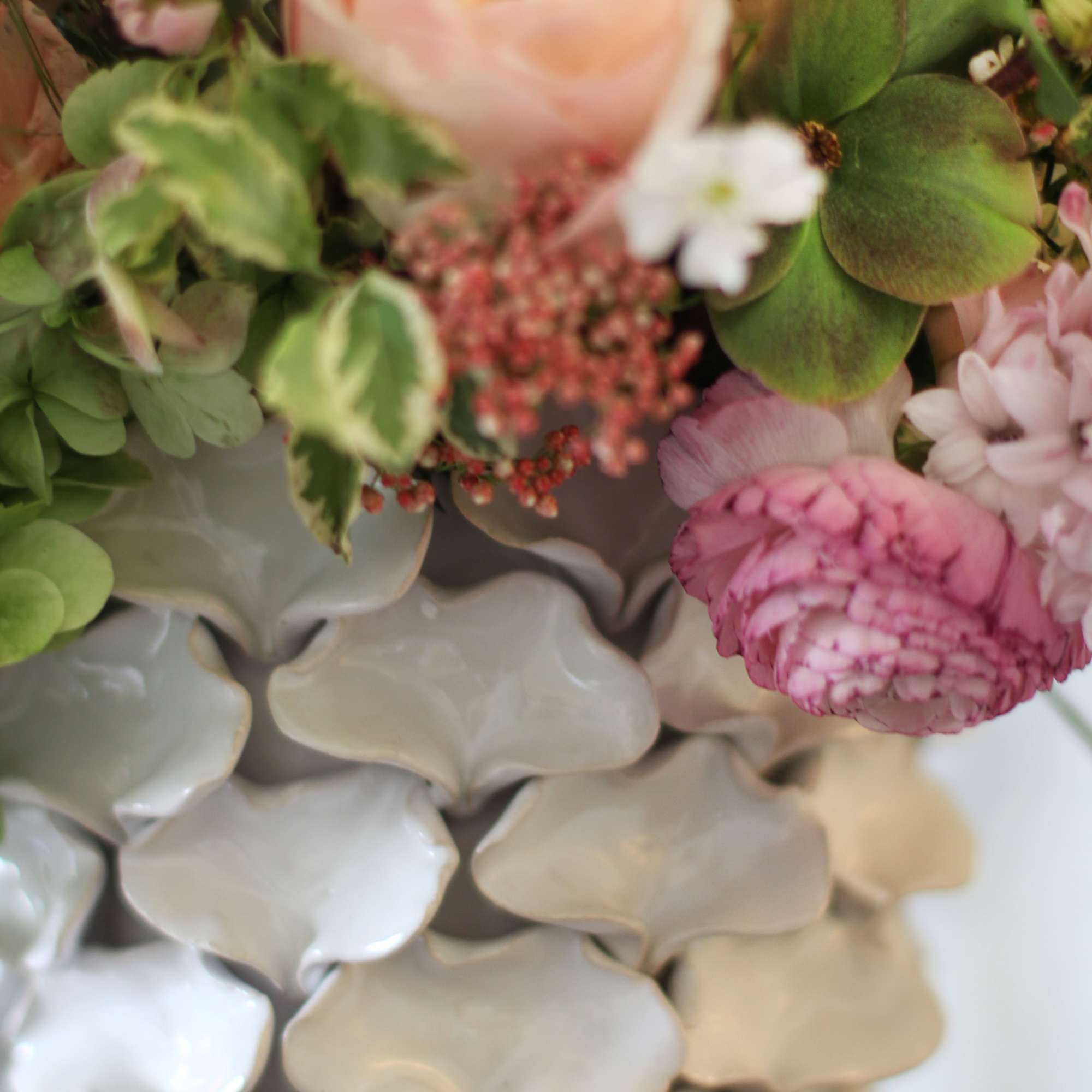 This arrangement creates with fragrant garden rose, Hyacinth, hydrangea, hellebore and seasonal