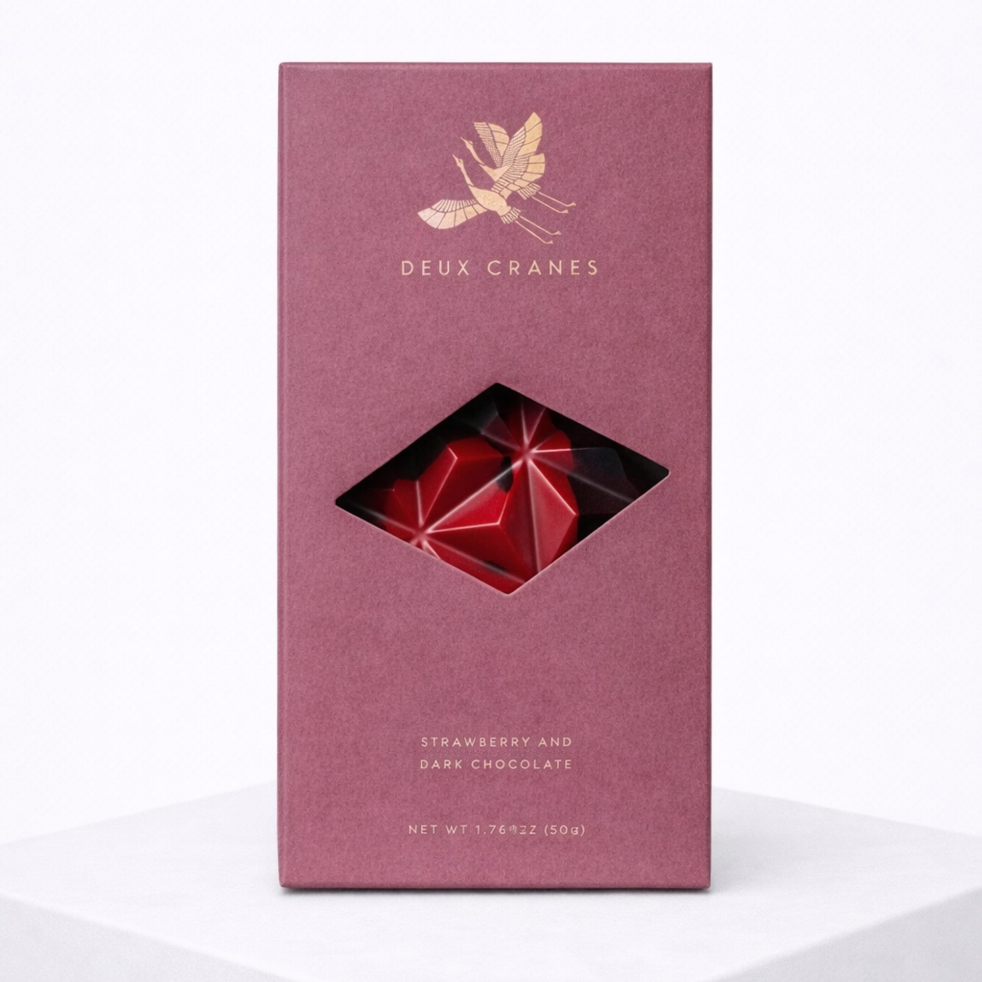 A bold yet romantic classic with a modern twist.
Rich, velvety dark chocolate