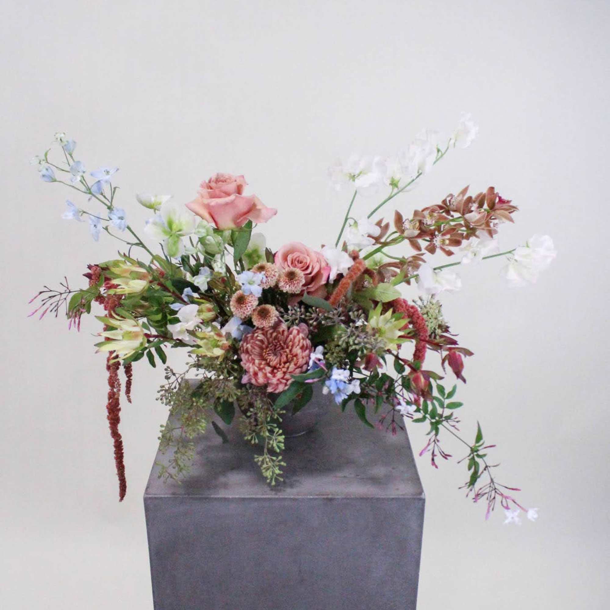Lush and seasonal designer's choice bouquet.