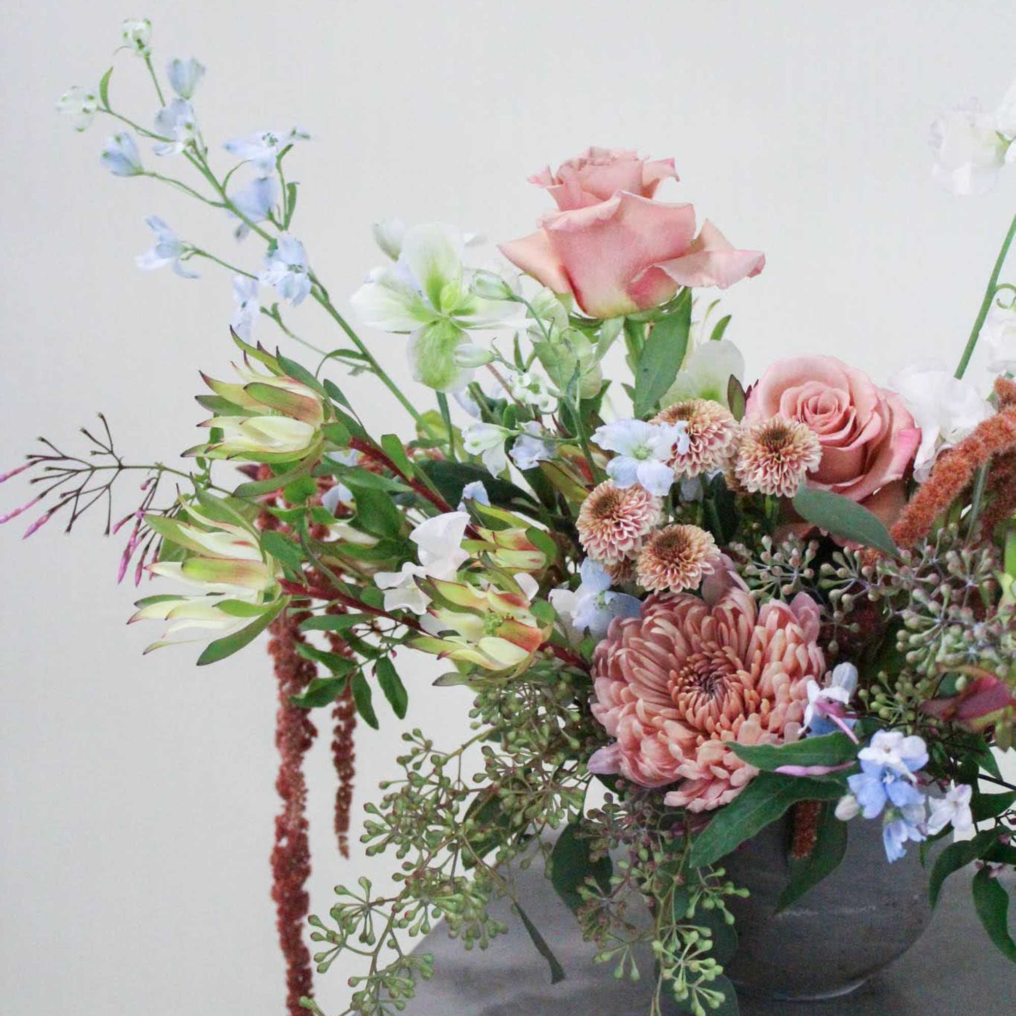Lush and seasonal designer's choice bouquet.