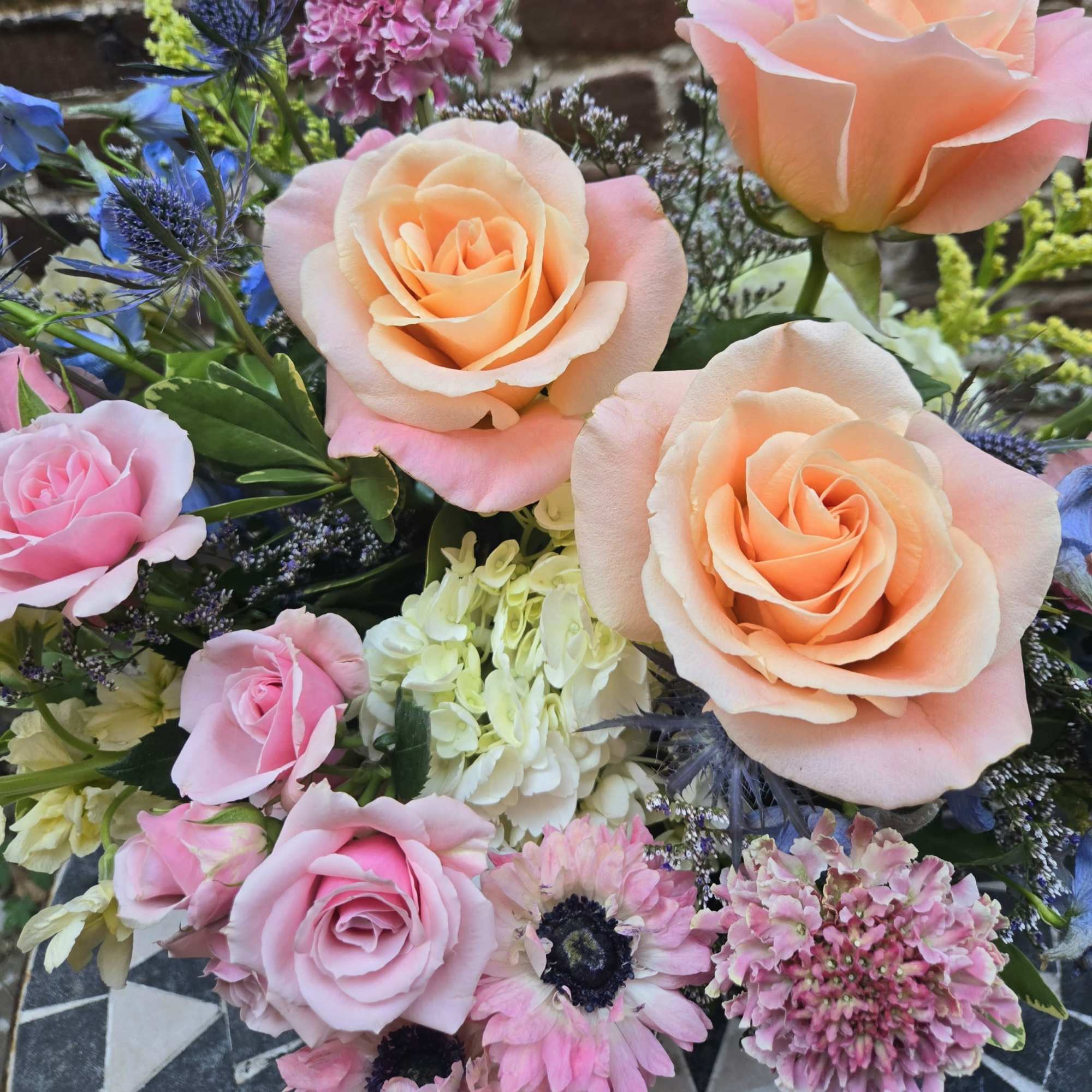 A romantic, soft and serene floral design in pastel colors of blue