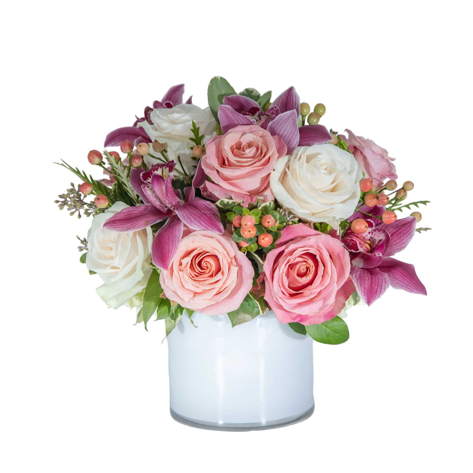 Pink and white roses with purple orchids in a glass vase