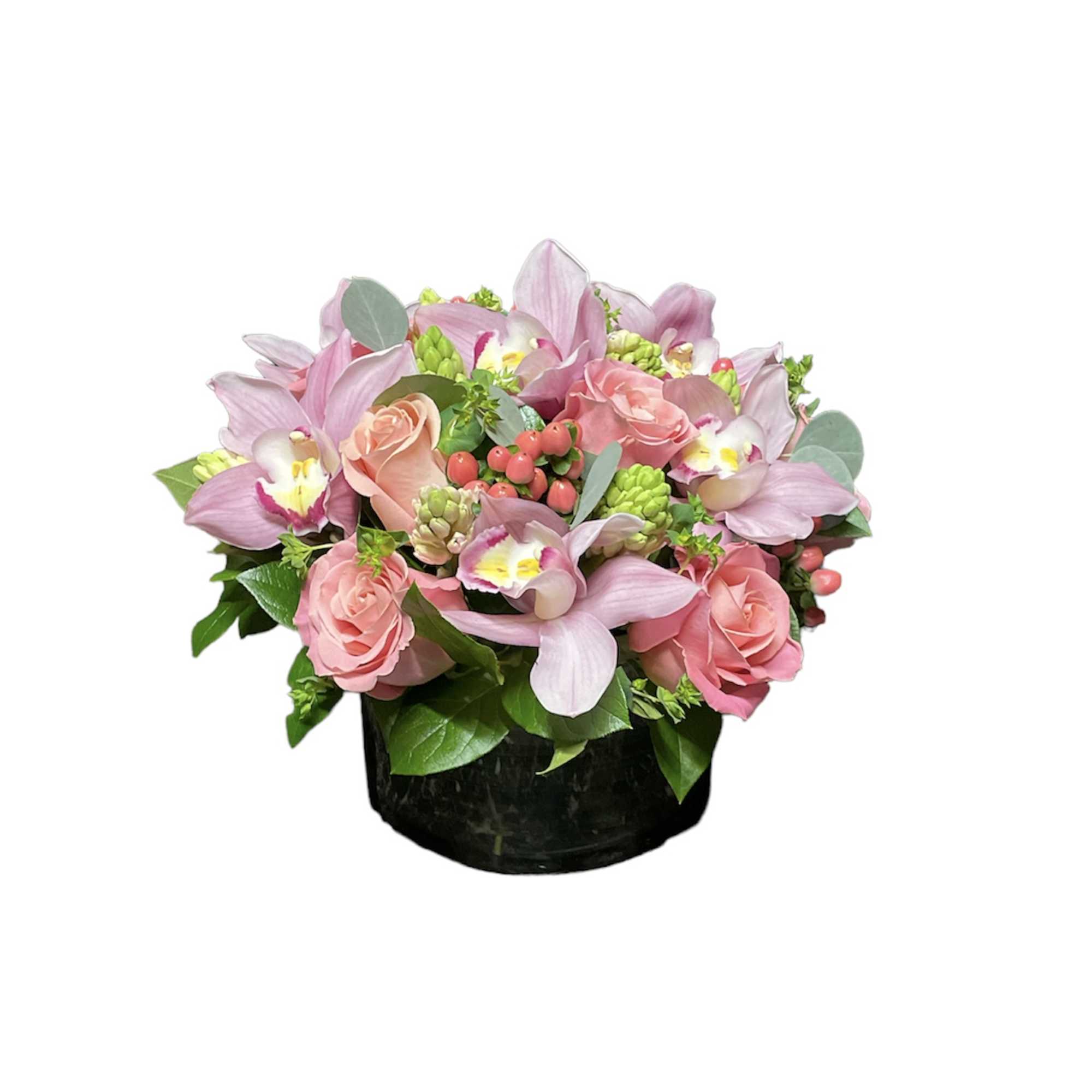 Pink roses and orchids arranged in a black vase