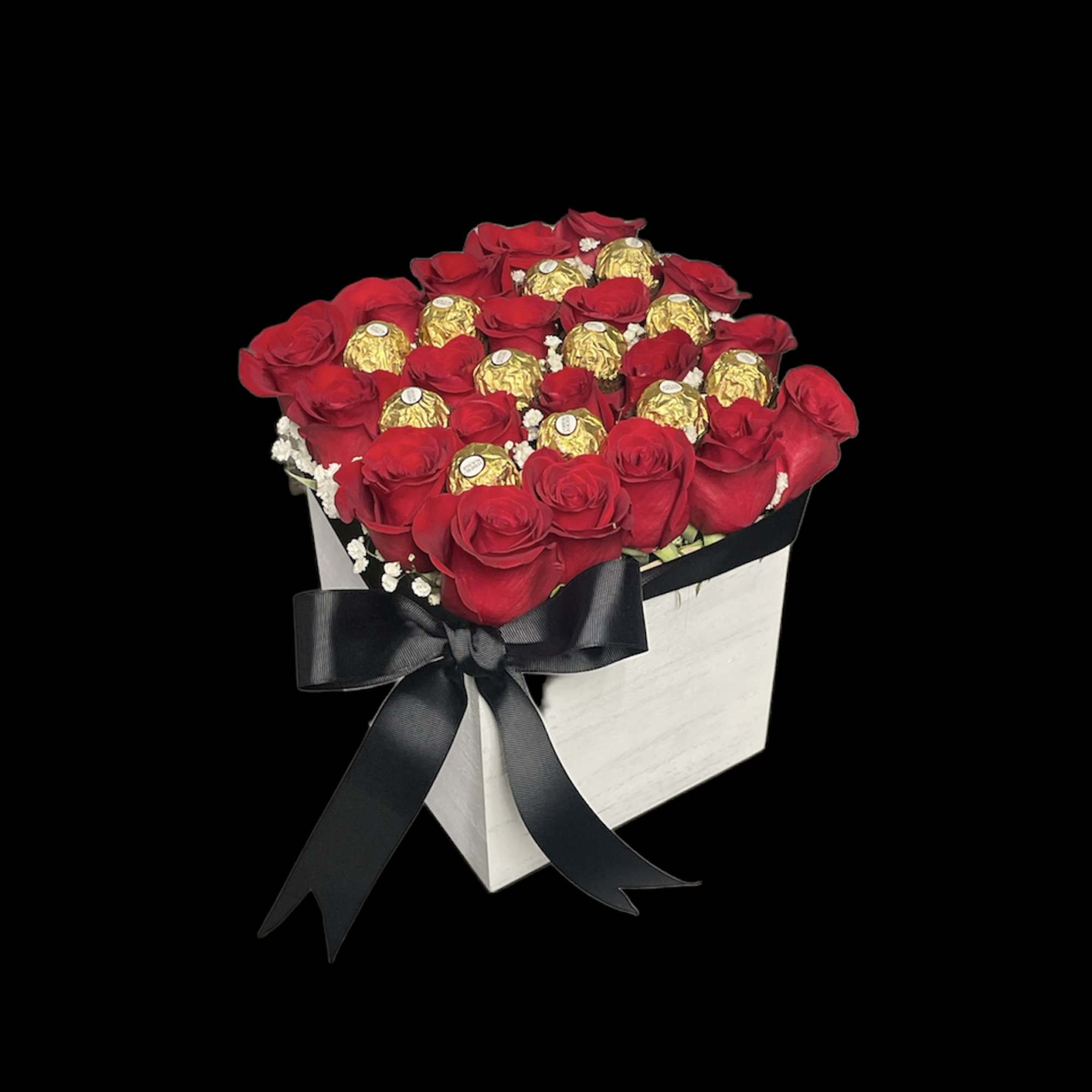 Square box of red roses with gold-wrapped chocolates and a black ribbon bow.