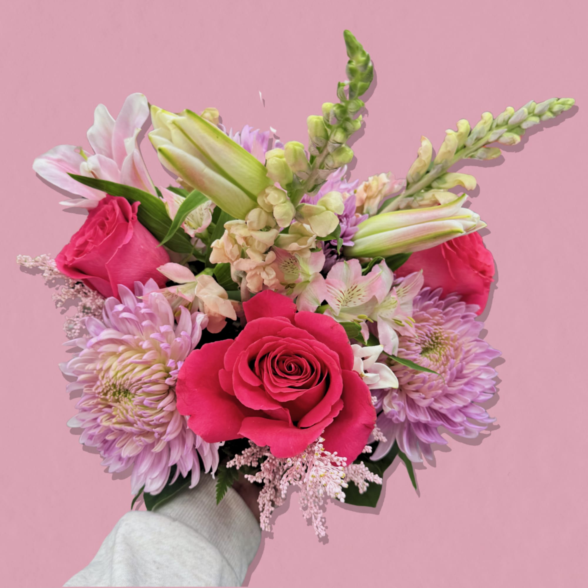 Bright, hand-tied bouquet designed to make the person you're thinking of feel