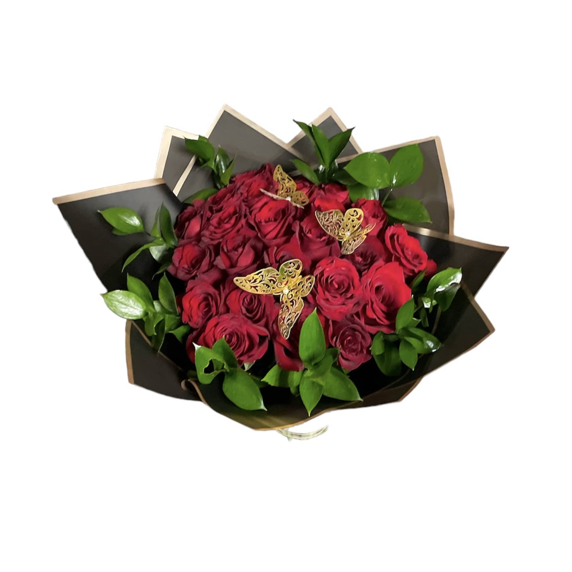 Bouquet of red roses with green leaves in dark wrapping
