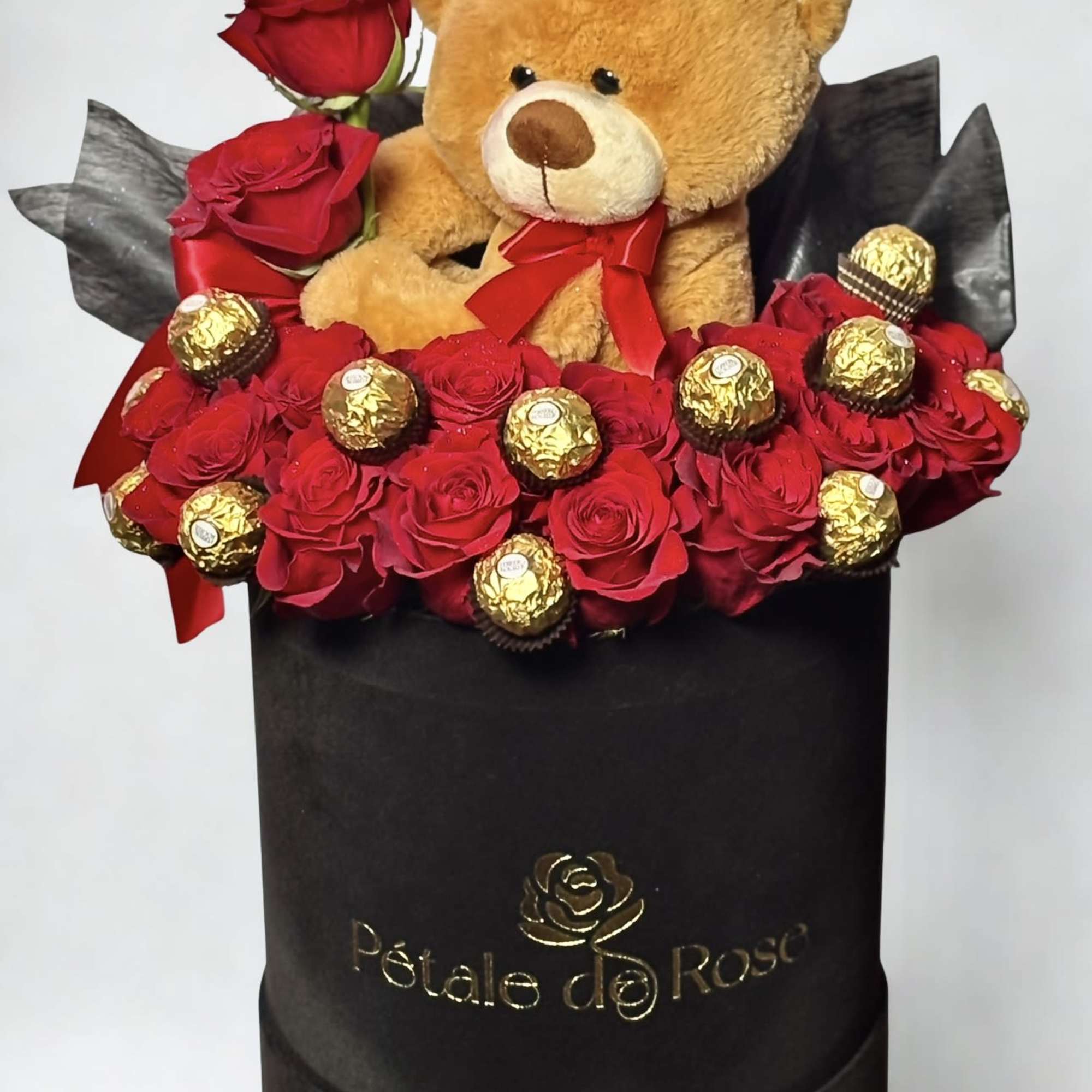 This elegant black box features 10 fresh red roses, beautifully arranged with
