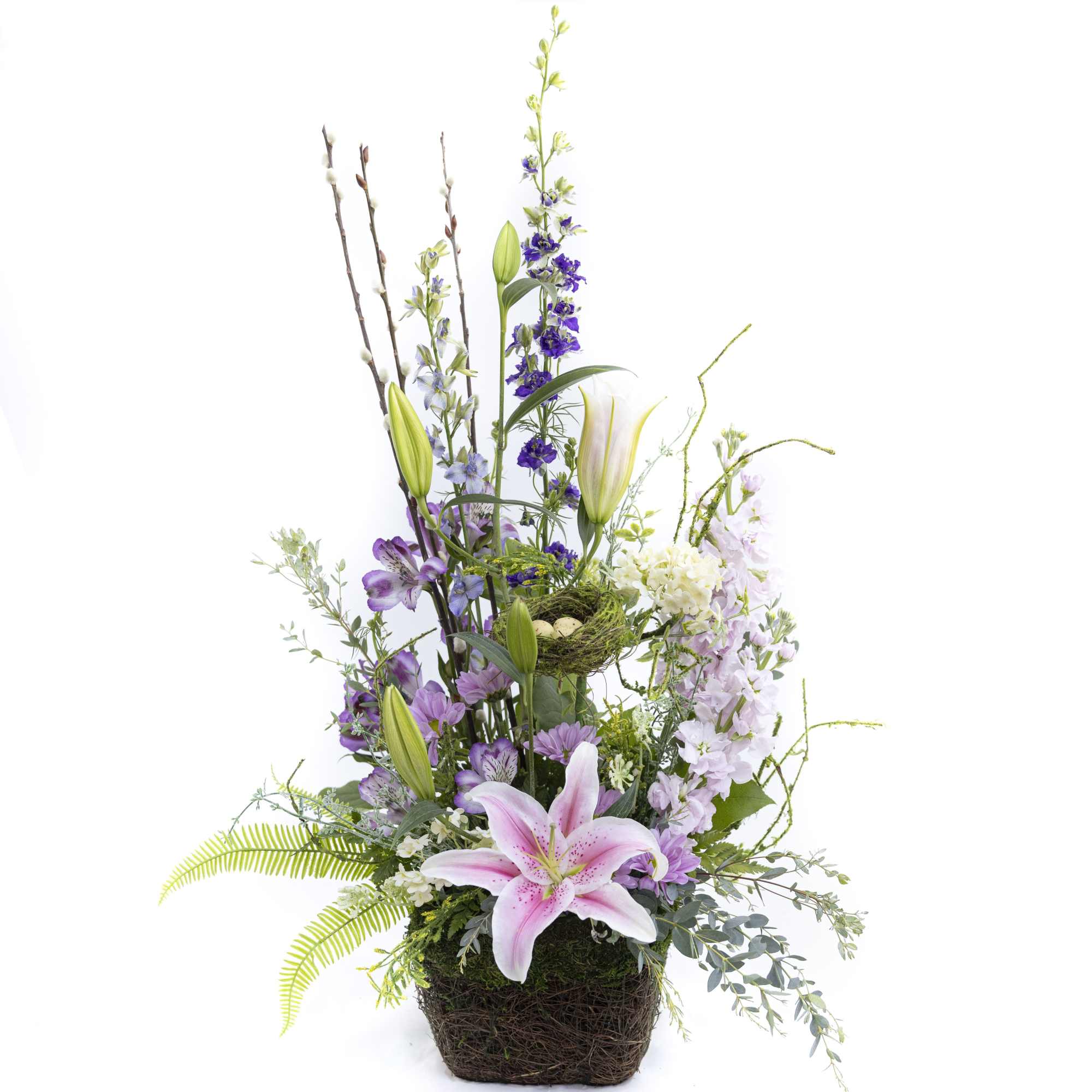 Elegant, whimsical, and softly enchanting&mdash;The Violet is a floral arrangement designed to