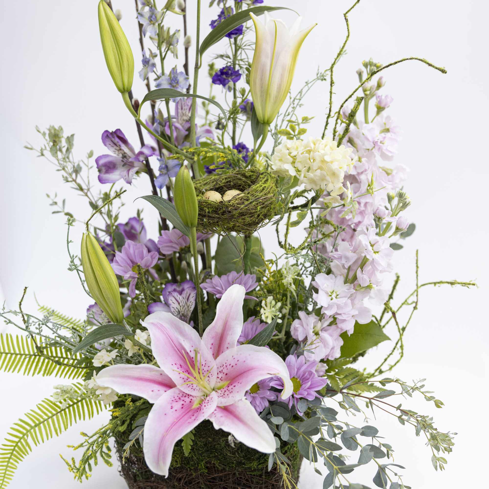 Elegant, whimsical, and softly enchanting&mdash;The Violet is a floral arrangement designed to