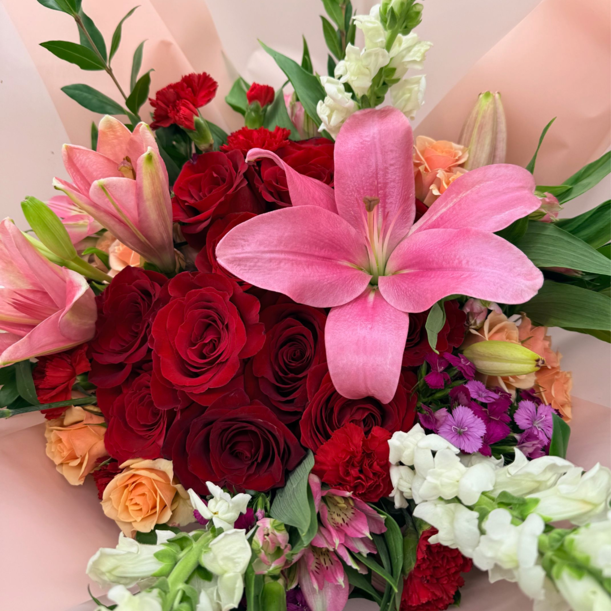 Like a little garden gathered just for you! Featuring romantic roses, blooming